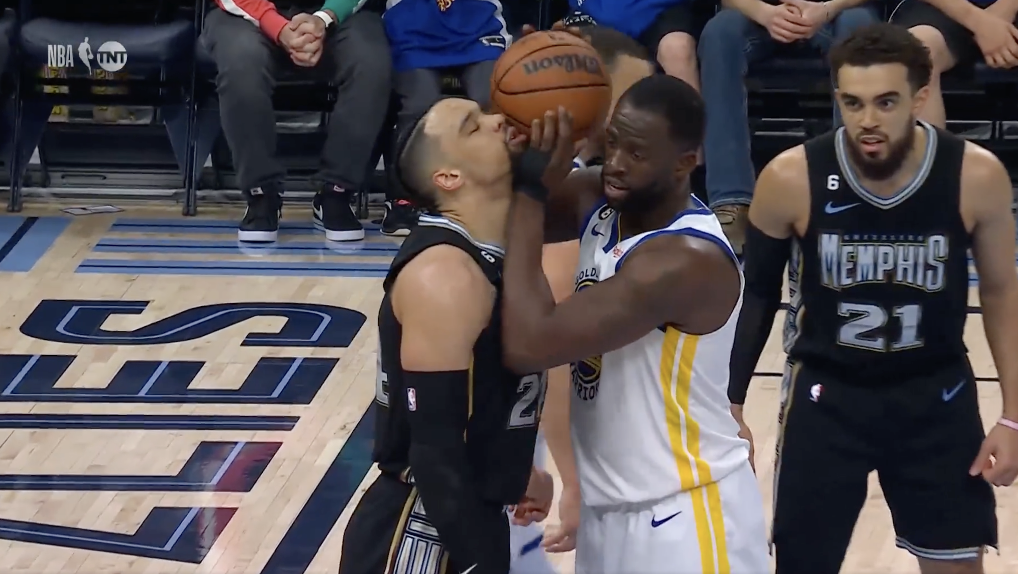 Draymond Green and Dillon Brooks nearly smooch.