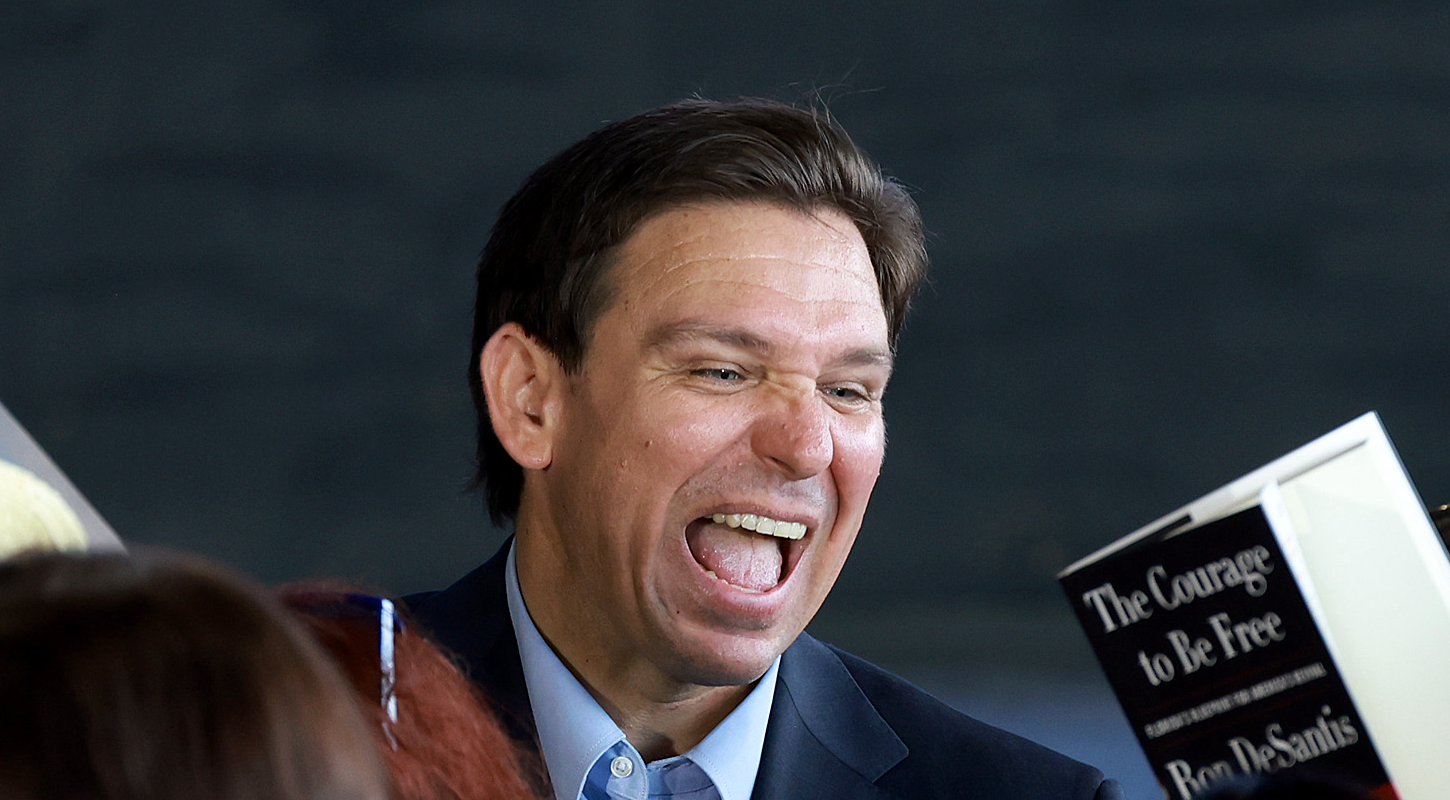 Ron DeSantis with his big gross mouth open like a nightmare baby bird.