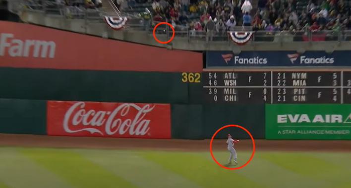 Screenshot of Renfroe and the ball in flight, with each circled in red