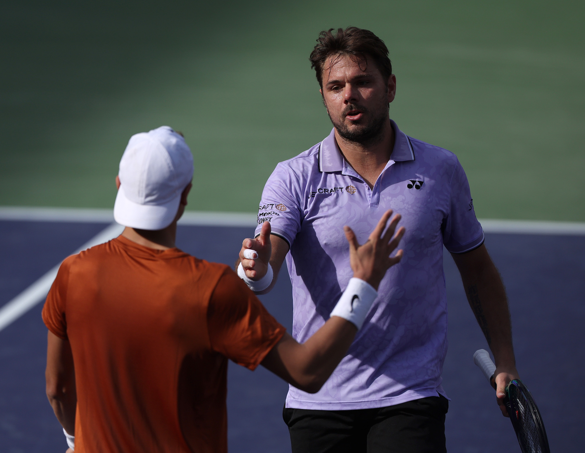 Stan Wawrinka and Holger Rune shake hands at Indian Wells