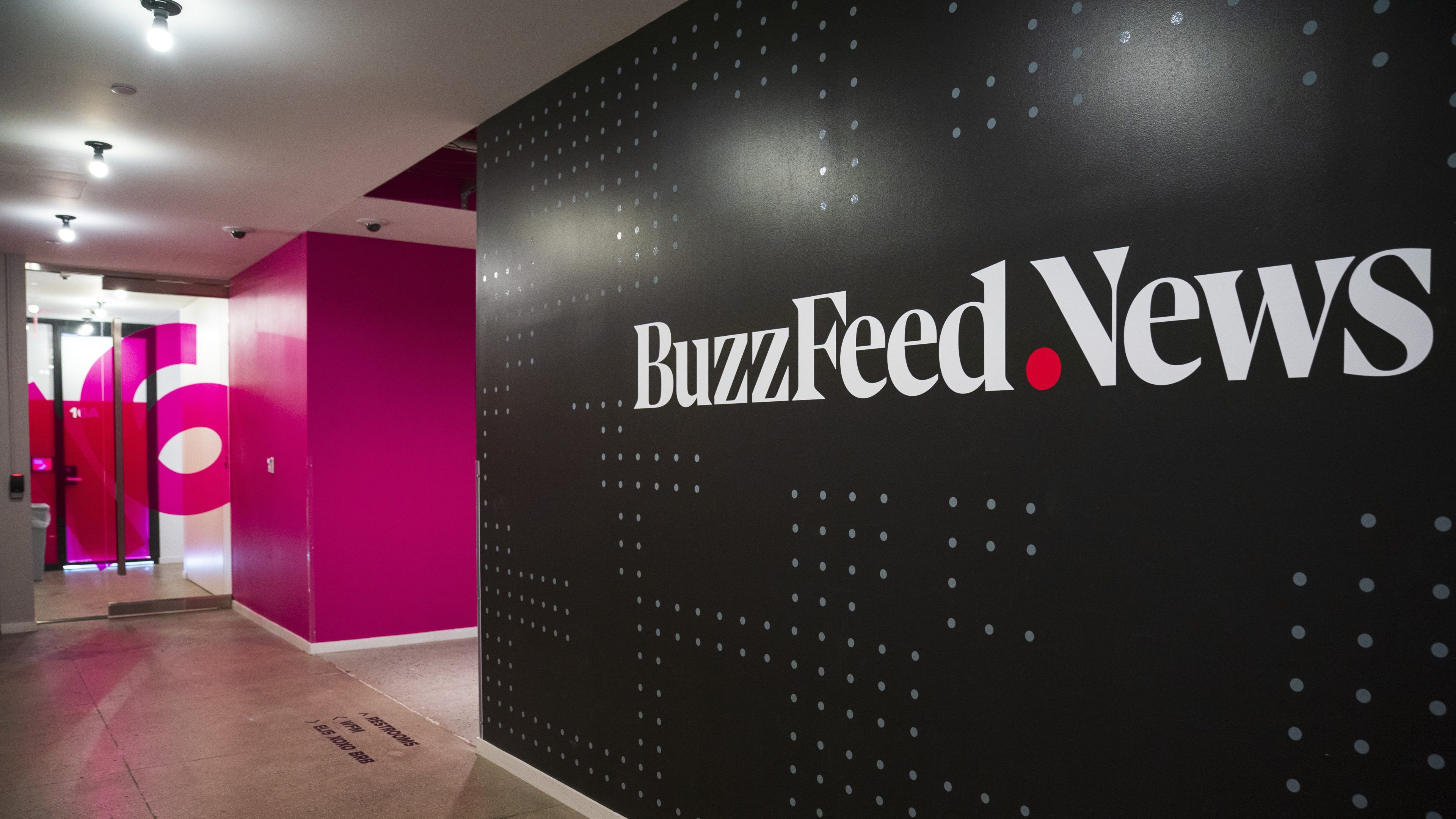 A BuzzFeed News logo adorns a wall inside BuzzFeed headquarters, December 11, 2018 in New York City.
