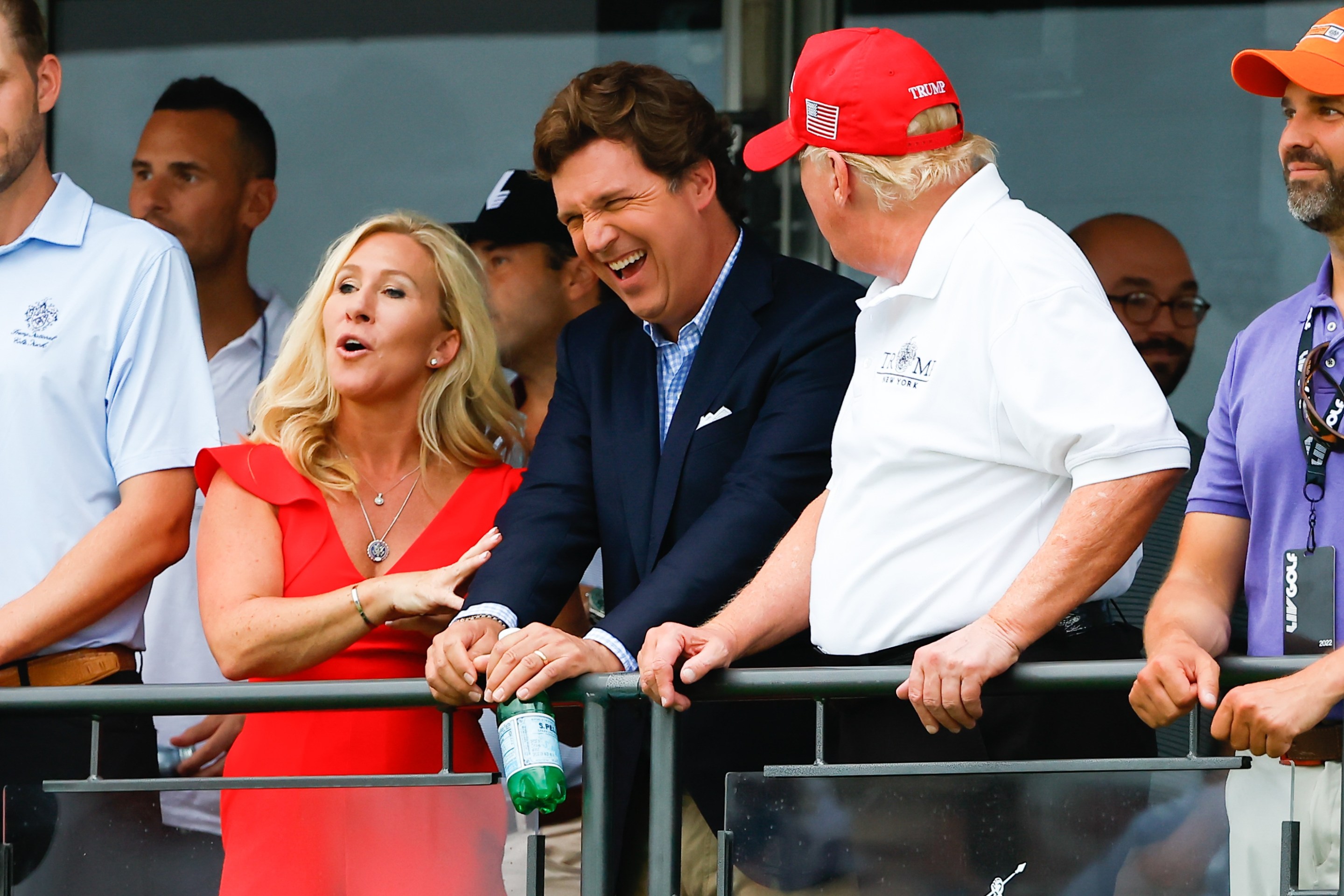 Former President Donald Trump, Tucker Carlson and Marjorie Taylor Greene during the 3rd round of the LIV Golf Invitational Series in July of 2022.