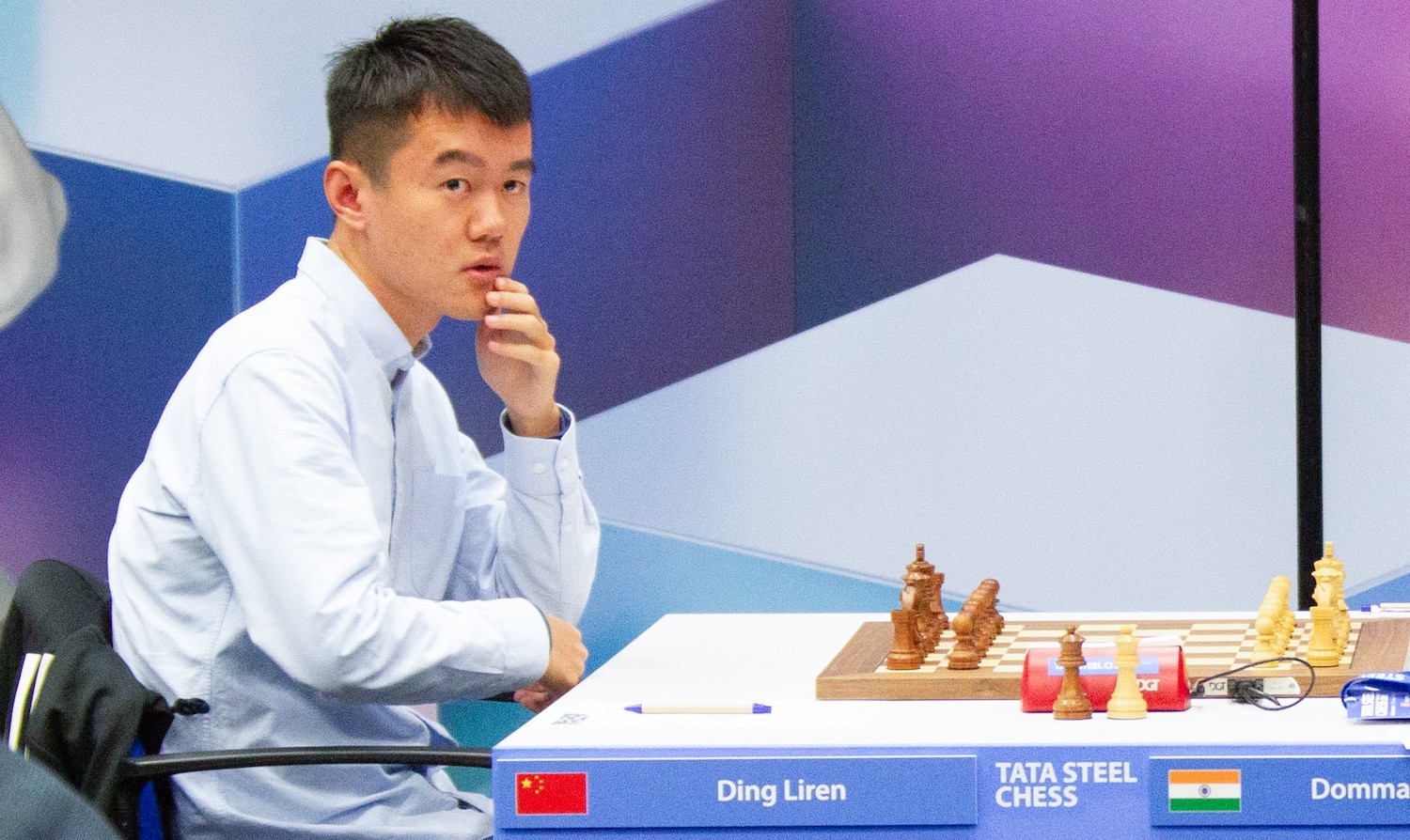 Ding Liren of China reacts while playing against Dommaraju Gukesh of India during the Tata Steel Chess Tournament 2023 in Wijk aan Zee, the Netherlands, Jan. 14, 2023. (Photo by Sylvia Lederer/Xinhua via Getty Images)