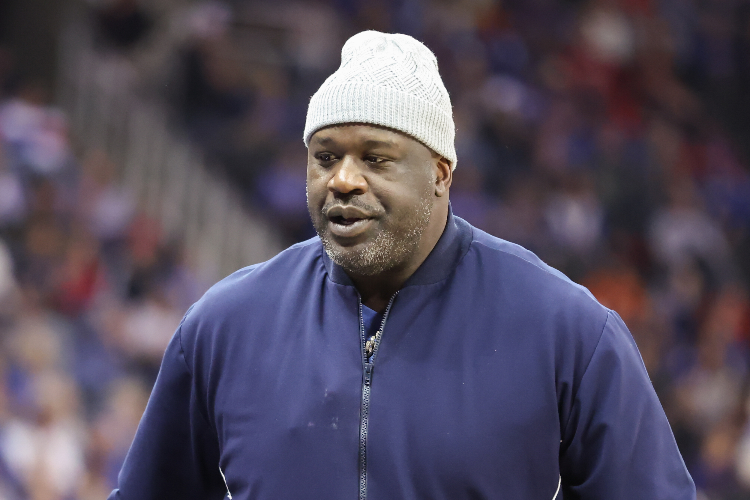 Shaquille O'Neal wears a hat and becomes practically invisible.