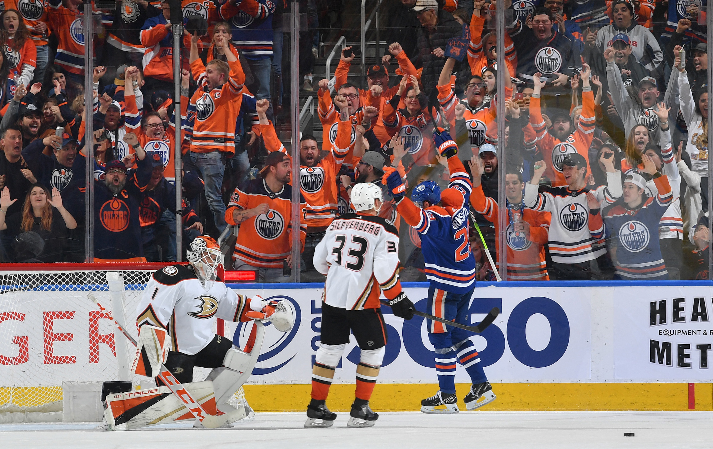 EDMONTON, CANADA - APRIL 01: Leon Draisaitl #29 of the Edmonton Oilers celebrates after scoring his third goal of the game against the Anaheim Ducks and 50th goal of the season on April 1, 2023 at Rogers Place in Edmonton, Alberta, Canada. (Photo by Andy Devlin/NHLI via Getty Images) *** Local Caption *** Leon Draisaitl;Lukas Dostal;Jakob Silfverberg