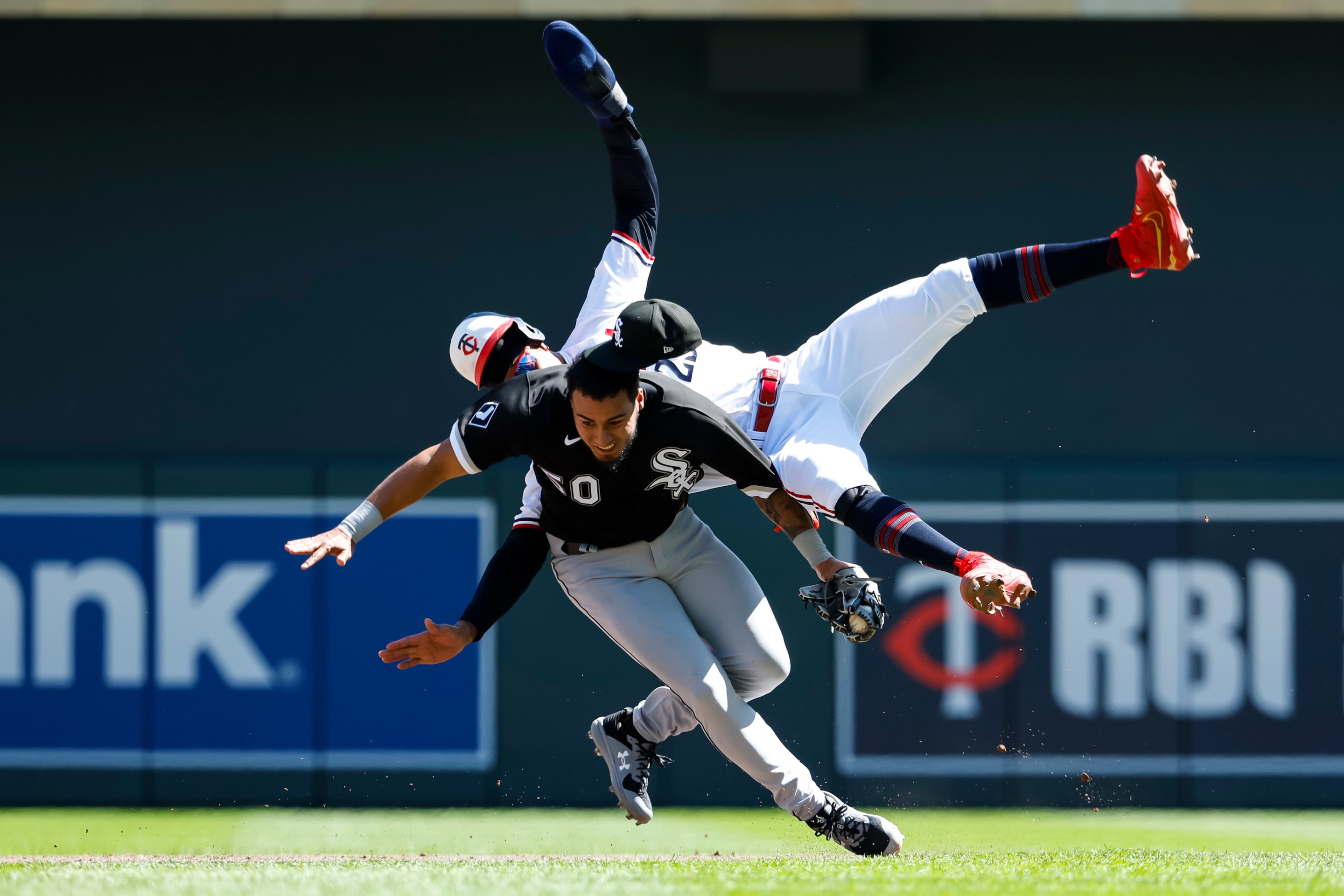 White Sox infielder Lenyn Sosa upends Twins outfielder Byron Buxton in a collision near second base on April 12, 2023.