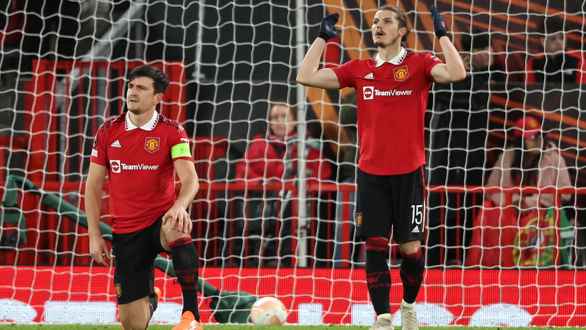 Harry Maguire of Manchester United reacts after scoring an own goal to make it 2-2 during the UEFA Europa League quarterfinal first leg match between Manchester United and Sevilla FC at Old Trafford on April 13, 2023 in Manchester, United Kingdom.