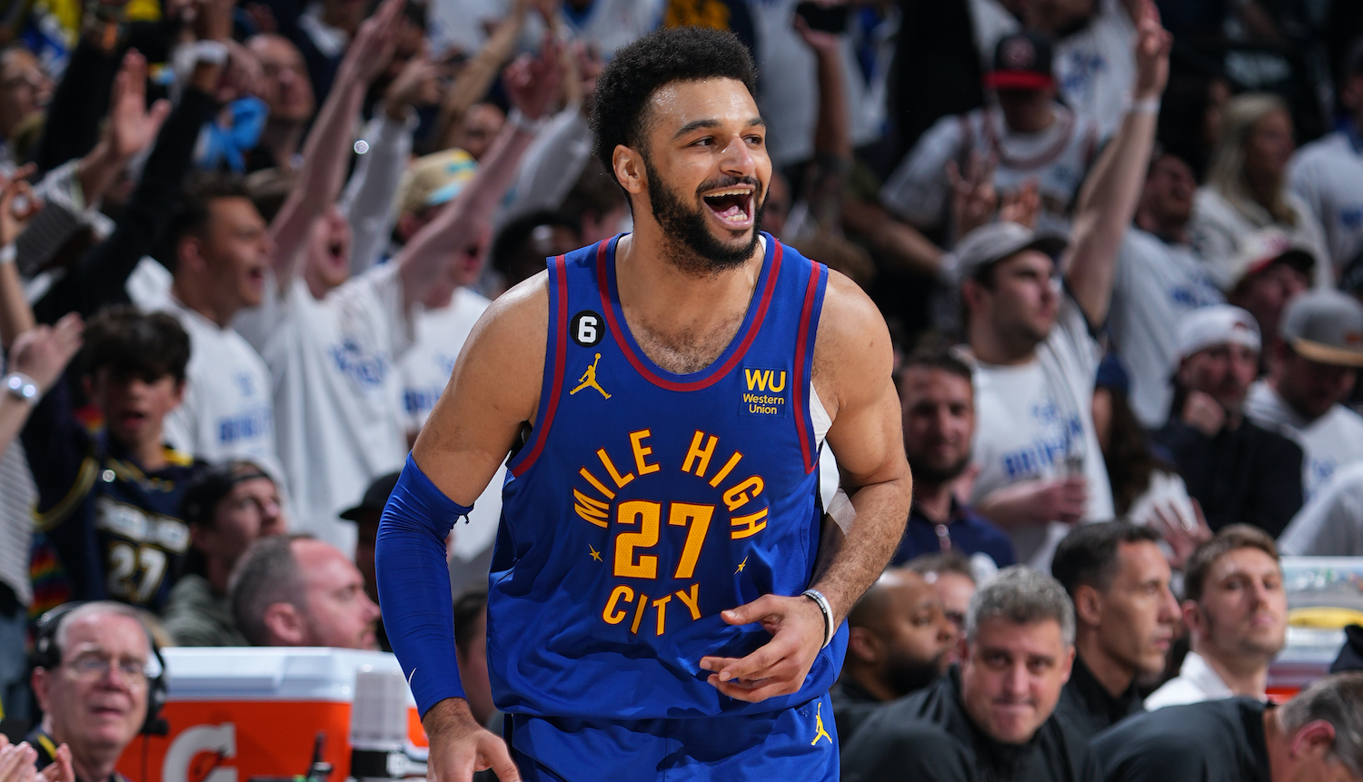 DENVER, CO - APRIL 16: Jamal Murray #27 of the Denver Nuggets smiles during Round One Game One of the 2023 NBA Playoffs against the Minnesota Timberwolves on April 16, 2023 at the Ball Arena in Denver, Colorado. NOTE TO USER: User expressly acknowledges and agrees that, by downloading and/or using this Photograph, user is consenting to the terms and conditions of the Getty Images License Agreement. Mandatory Copyright Notice: Copyright 2023 NBAE (Photo by Garrett Ellwood/NBAE via Getty Images)