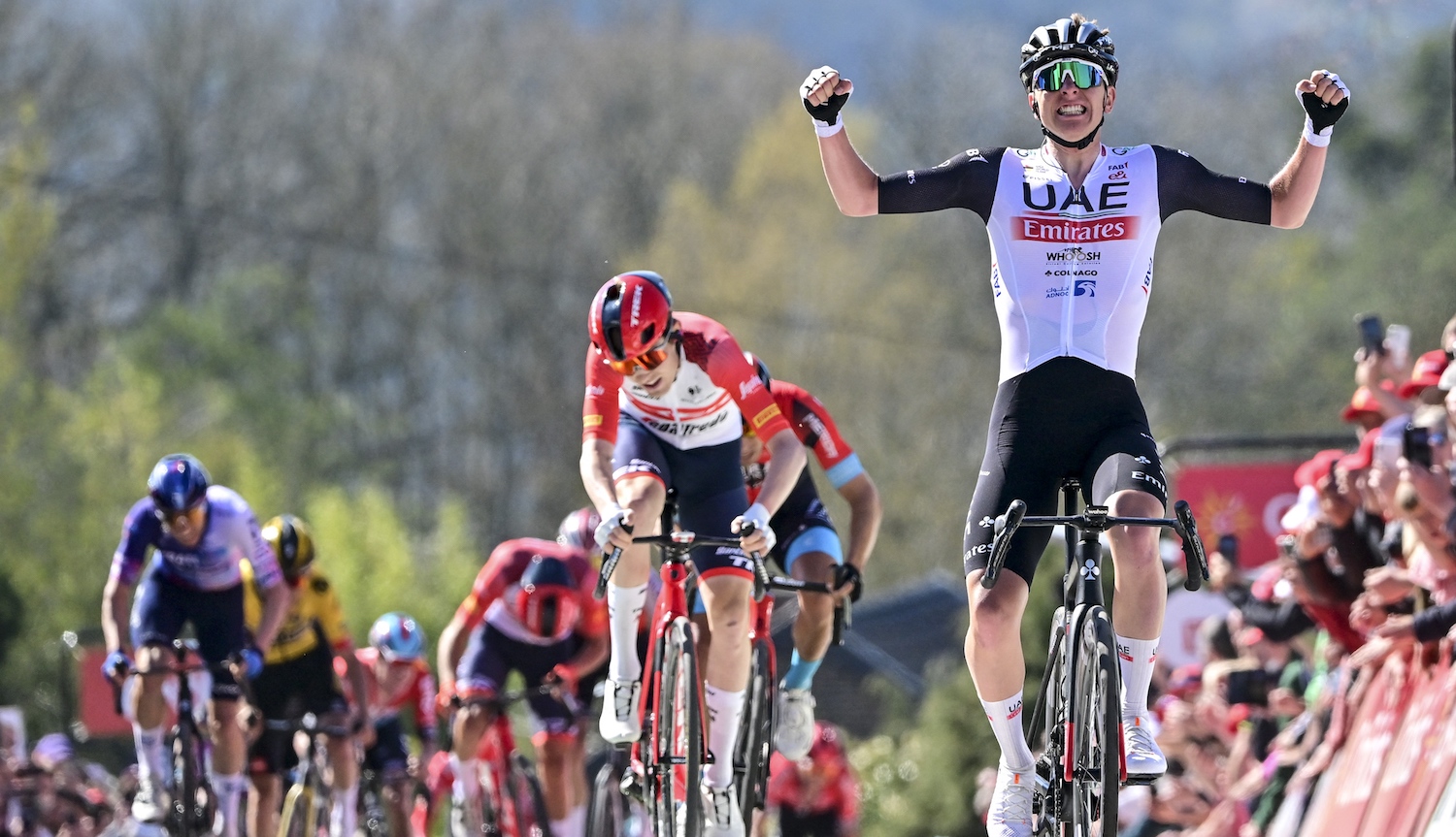 Slovenian Tadej Pogacar of UAE Team Emirates celebrates after winning the 86th edition of the men's race 'La Fleche Wallonne', a one day cycling race (Waalse Pijl - Walloon Arrow), 194,2 km from Herve to Huy, Wednesday 19 April 2023. BELGA PHOTO DIRK WAEM (Photo by DIRK WAEM / BELGA MAG / Belga via AFP) (Photo by DIRK WAEM/BELGA MAG/AFP via Getty Images)