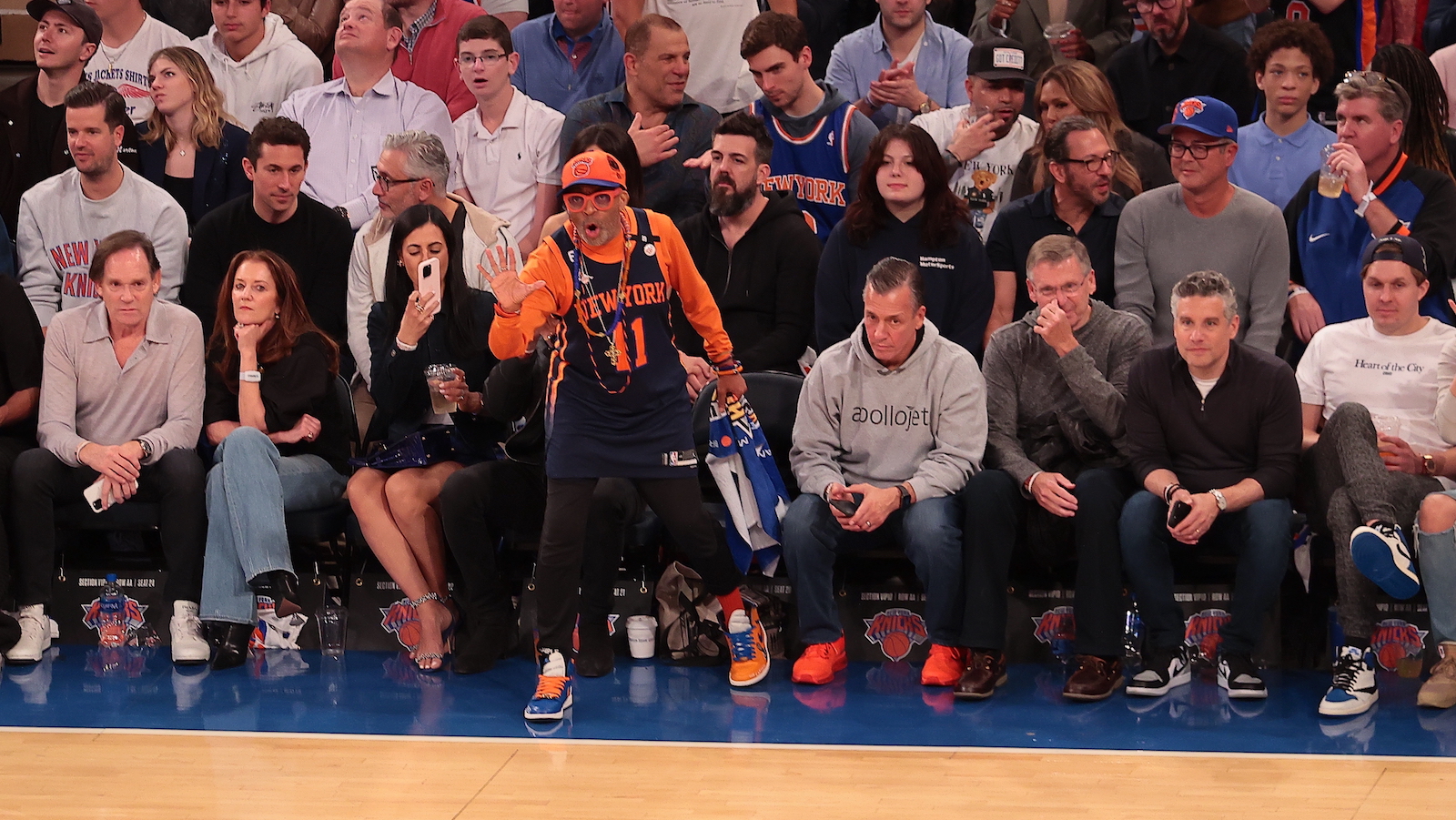 NEW YORK, UNITED STATES - APRIL 21: Fans of the New York Knicks are seen during the game against the Cleveland Cavaliers at Madison Square Garden, New York City, United States. Filmmaker Shelton Jackson "Spike" Lee watches the game with a Knicks jersey at Madison Square Garden.