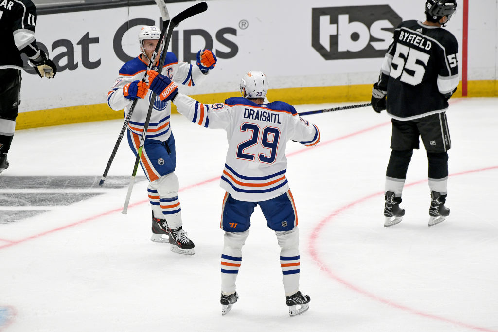 Connor McDavid congratulates Leon Draisaitl