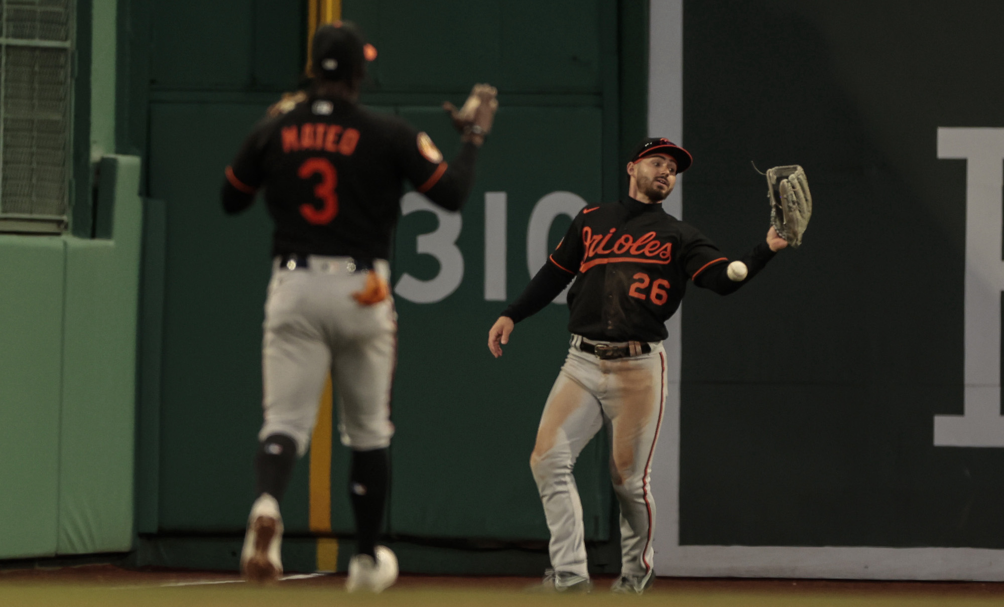 BOSTON, MASSACHUSETTS - APRIL 01: Ryan McKenna #26 of the Baltimore Orioles drops what would have been the game ending out during the ninth inning against the Boston Red Sox at Fenway Park on April 01, 2023 in Boston, Massachusetts. (Photo by Nick Grace/Getty Images)