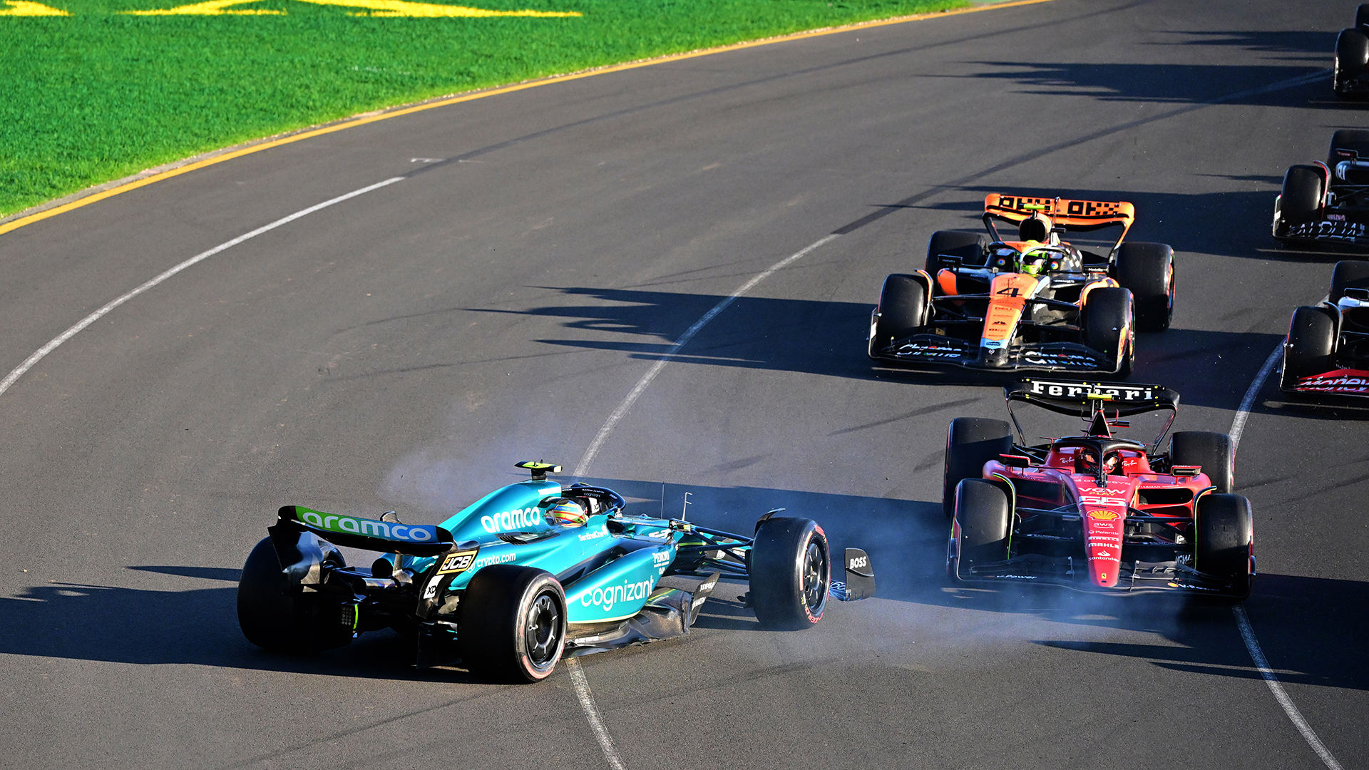Fernando Alonso of Spain driving the (14) Aston Martin AMR23 Mercedes spins after a collision at the second restart during the F1 Grand Prix of Australia at Albert Park Grand Prix Circuit on April 02, 2023 in Melbourne, Australia.