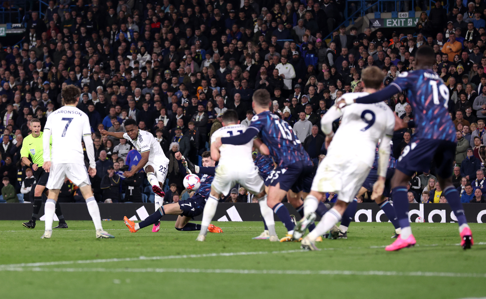 LEEDS, ENGLAND - APRIL 04: Luis Sinisterra of Leeds United scores the team's second goal whilst under pressure from Neco Williams of Nottingham Forest during the Premier League match between Leeds United and Nottingham Forest at Elland Road on April 04, 2023 in Leeds, England.