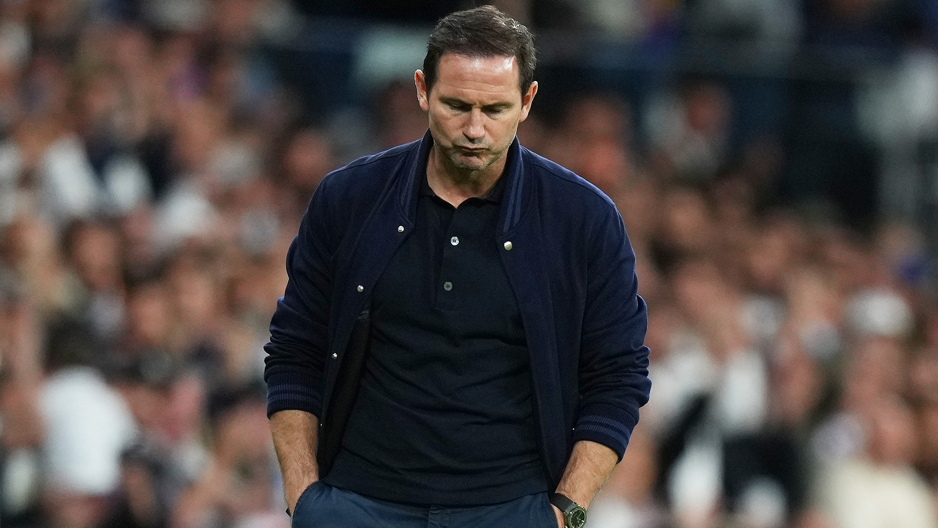 Frank Lampard, Caretaker Manager of Chelsea, looks dejected during the UEFA Champions League quarterfinal first leg match between Real Madrid and Chelsea FC at Estadio Santiago Bernabeu on April 12, 2023 in Madrid, Spain.