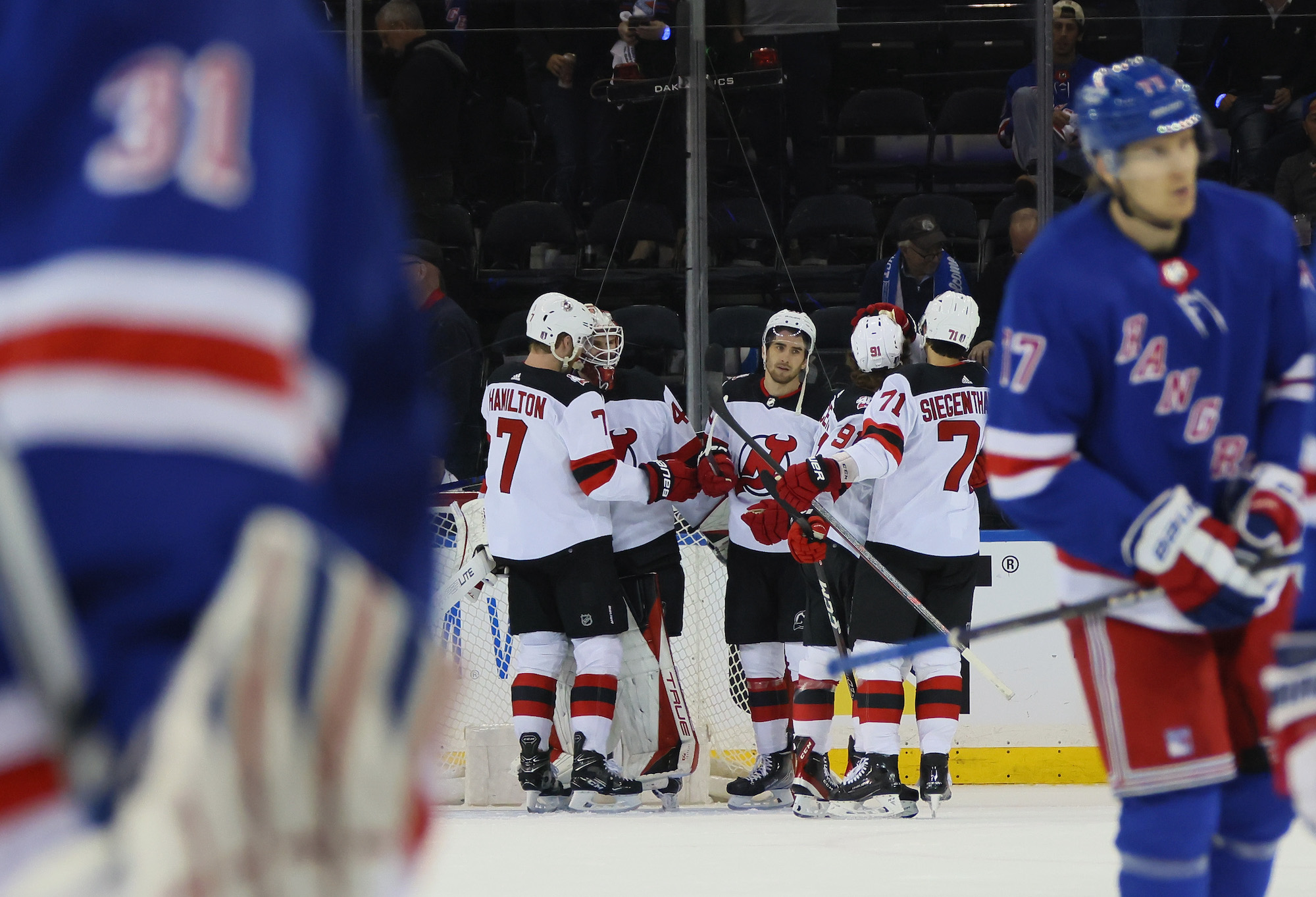 NEW YORK, NEW YORK - APRIL 24: The New Jersey Devils celebrate a 3-1 victory over the New York Rangers in Game Four of the First Round of the 2023 Stanley Cup Playoffs at Madison Square Garden on April 24, 2023 in New York, New York. (Photo by Bruce Bennett/Getty Images)