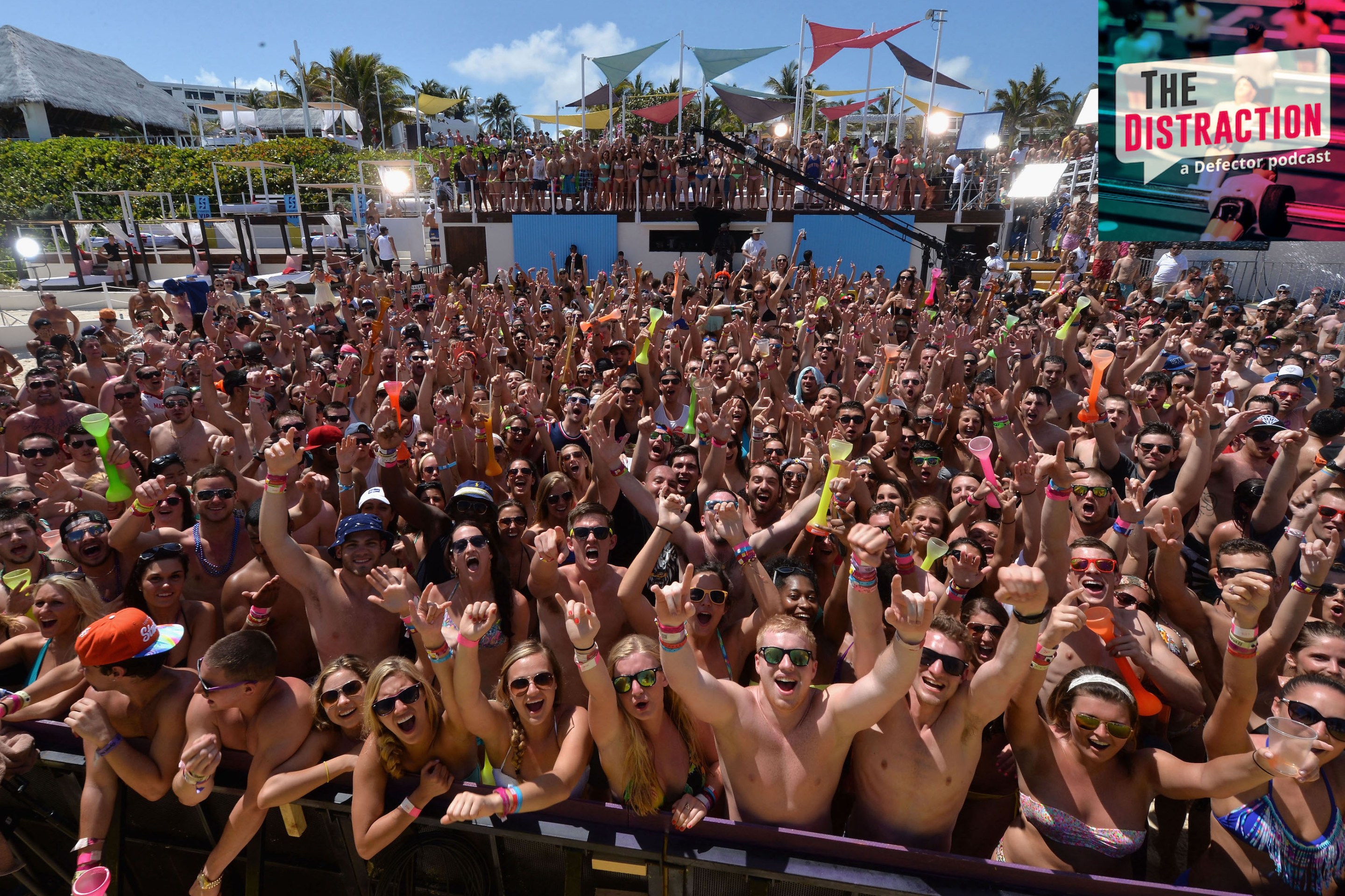 A photo of a bunch of people hooting and partying at the MTV Spring Break event in Cancun in 2014.