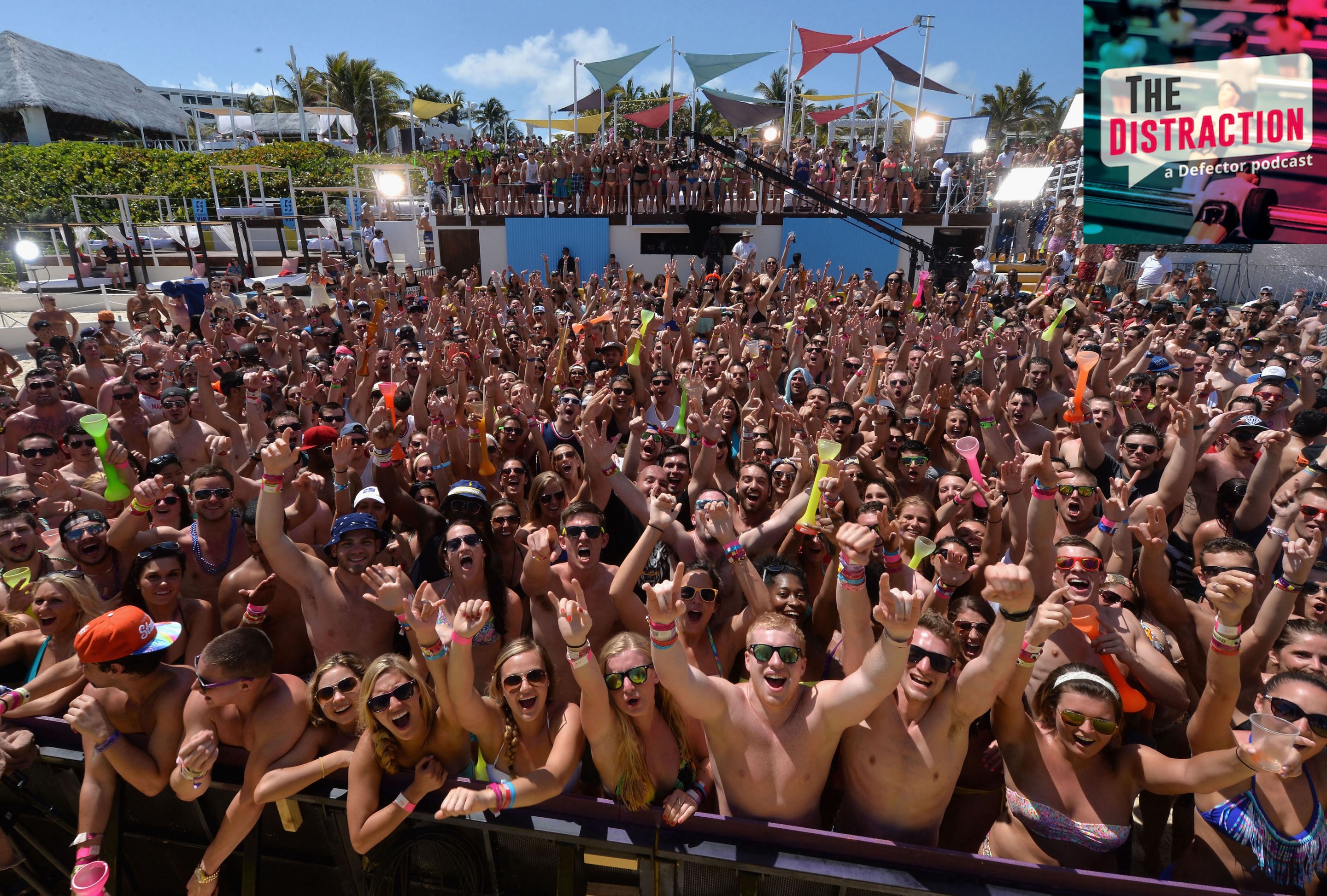 A photo of a bunch of people hooting and partying at the MTV Spring Break event in Cancun in 2014.