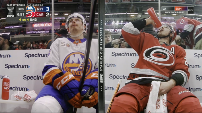 Split screen of Islanders Aho on the left and Canes Aho on the right, both in the penalty box at the same time.