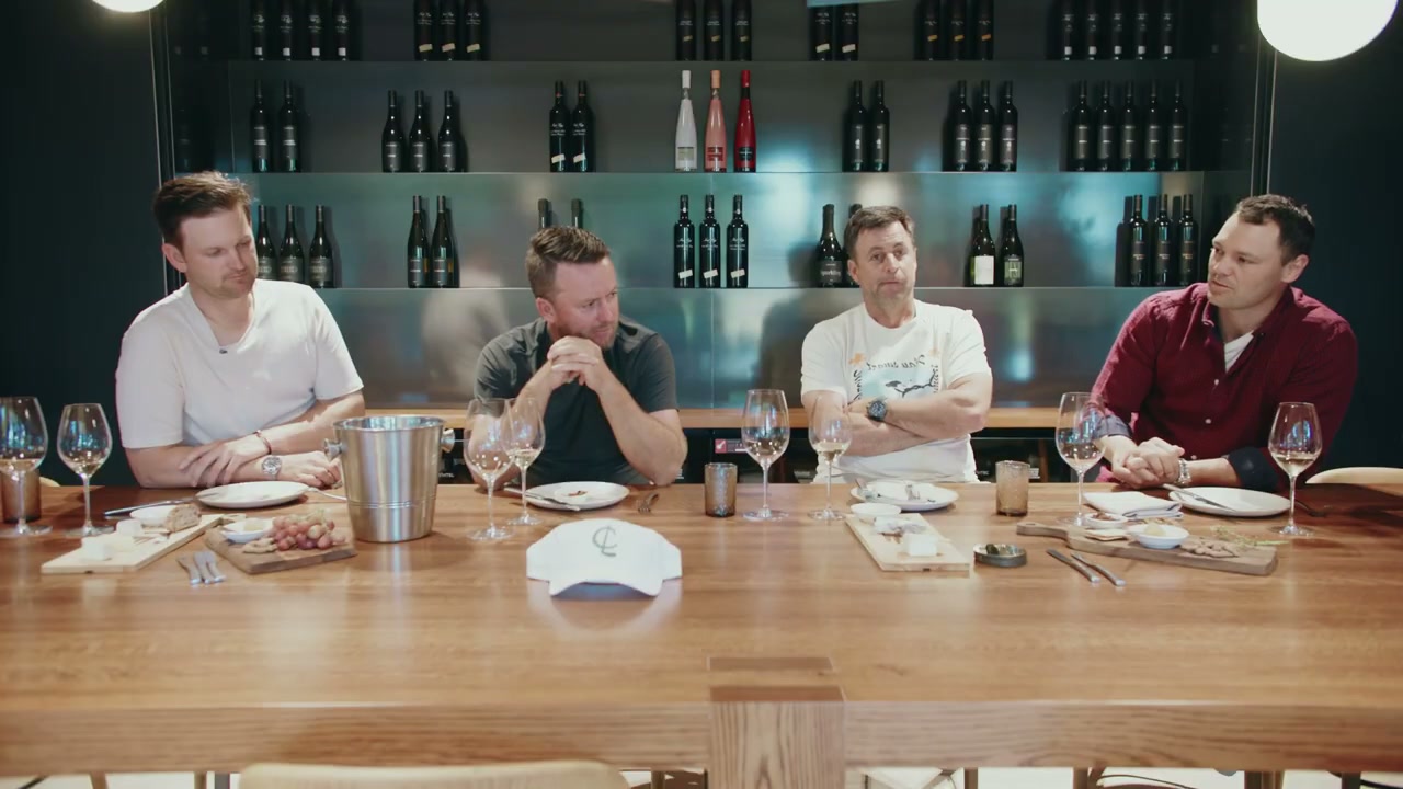 Martin Kaymer, Graeme McDowell, Bernd Wiesberger and Richard Bland sitting at a wine tasting