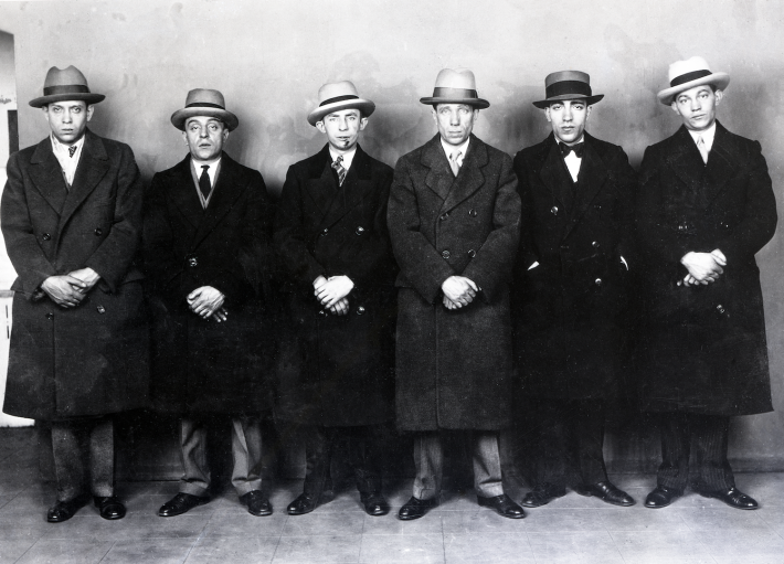 A lineup of early 20th-century outlaws from the Candy Kid Whittemore gang.