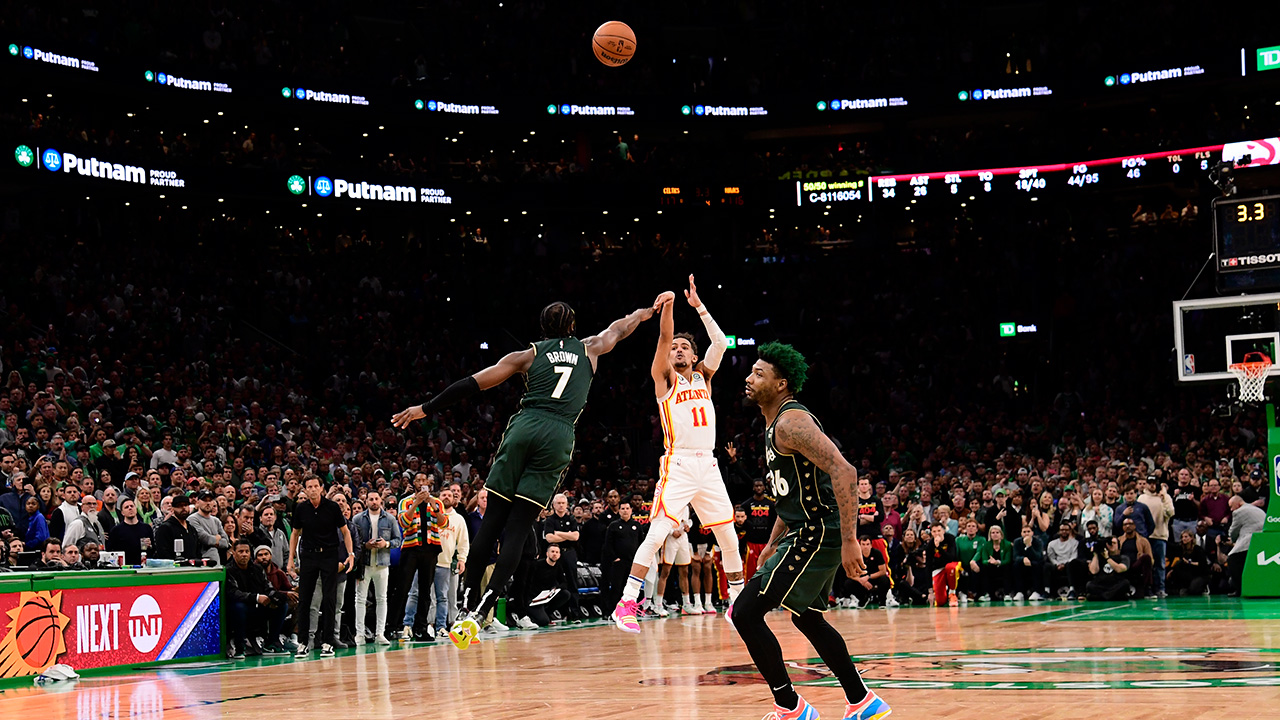 BOSTON, MA - APRIL 25: Trae Young #11 of the Atlanta Hawks scores the game winning shot during the game against the Boston Celtics during Round One Game Five of the 2023 NBA Playoffs on April 25, 2023 at the TD Garden in Boston, Massachusetts.