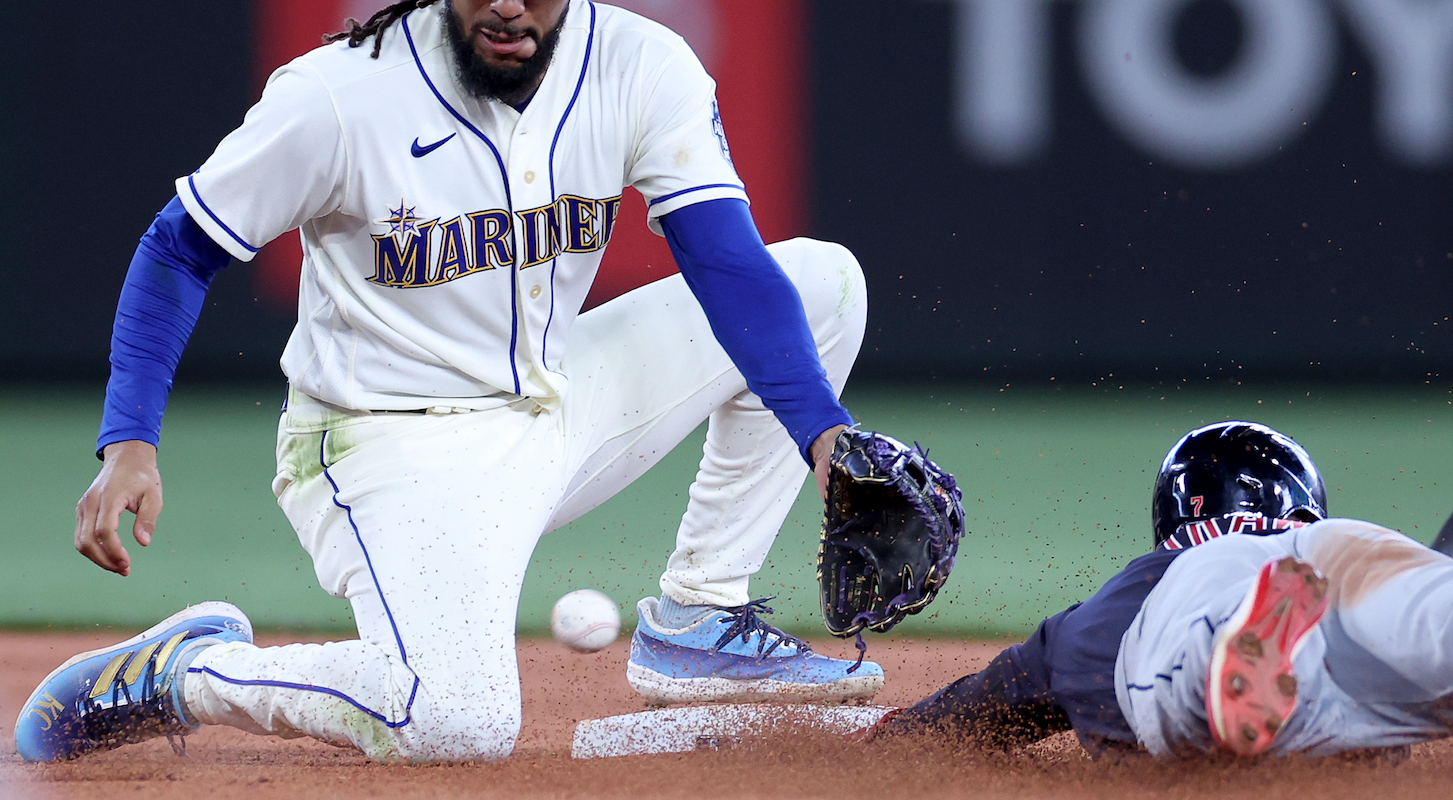 A close play on a steal attempt at second base, between the Seattle Mariners and Cleveland Guardians.