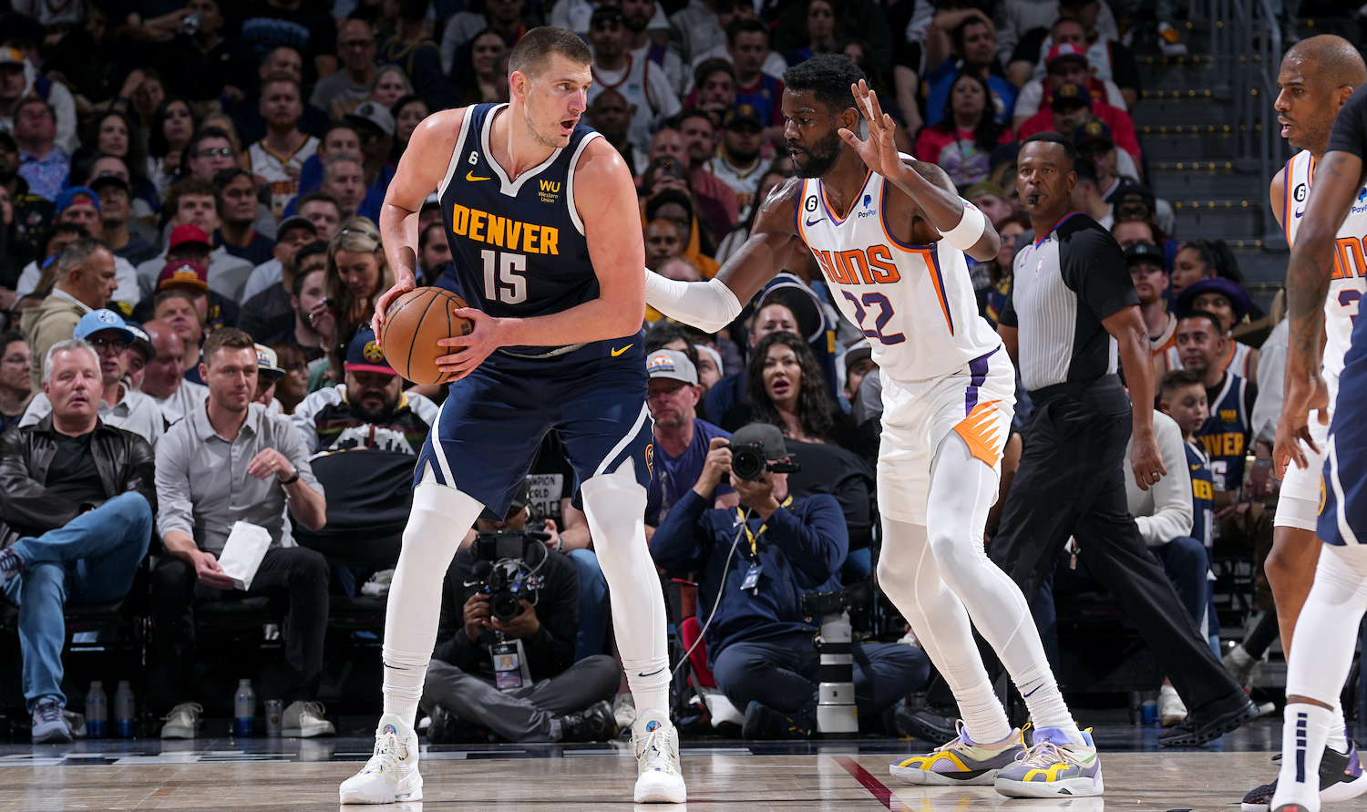 DENVER, CO - MAY 1: Nikola Jokic #15 of the Denver Nuggets handles the ball against the Phoenix Suns during Round 2 Game 2 of the 2023 NBA Playoffs on May 1, 2023 at the Ball Arena in Denver, Colorado. NOTE TO USER: User expressly acknowledges and agrees that, by downloading and/or using this Photograph, user is consenting to the terms and conditions of the Getty Images License Agreement. Mandatory Copyright Notice: Copyright 2023 NBAE (Photo by Bart Young/NBAE via Getty Images)