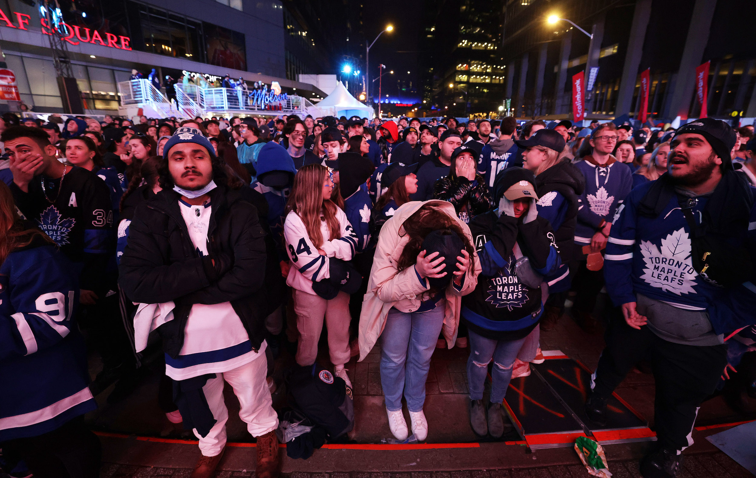 TORONTO, ON- MAY 7 - Toronto Maple Leafs fans leave after the Leafs fall 3-2 in Florida for game three in the second round of the NHL Stanley Cup playoffs, Toronto fans gathered at Maple Leaf Square outside Scotiabank Arena in Toronto. May 7, 2023. (Steve Russell/Toronto Star via Getty Images)