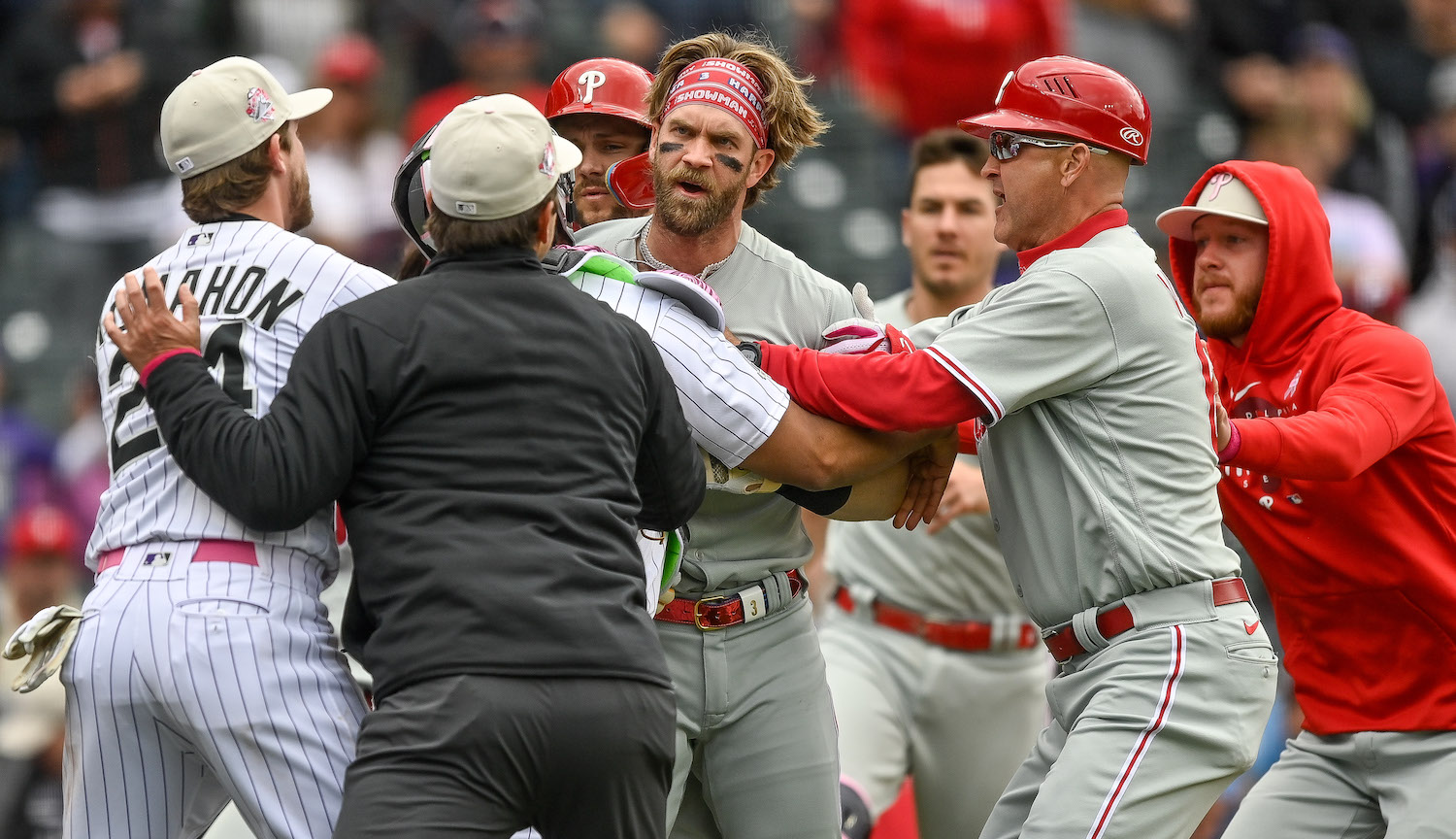 Bryce Harper #3 of the Philadelphia Phillies runs on the field as the benches clear in the seventh inning of a game at Coors Field on May 14, 2023 in Denver, Colorado. (Photo by Dustin Bradford/Getty Images)