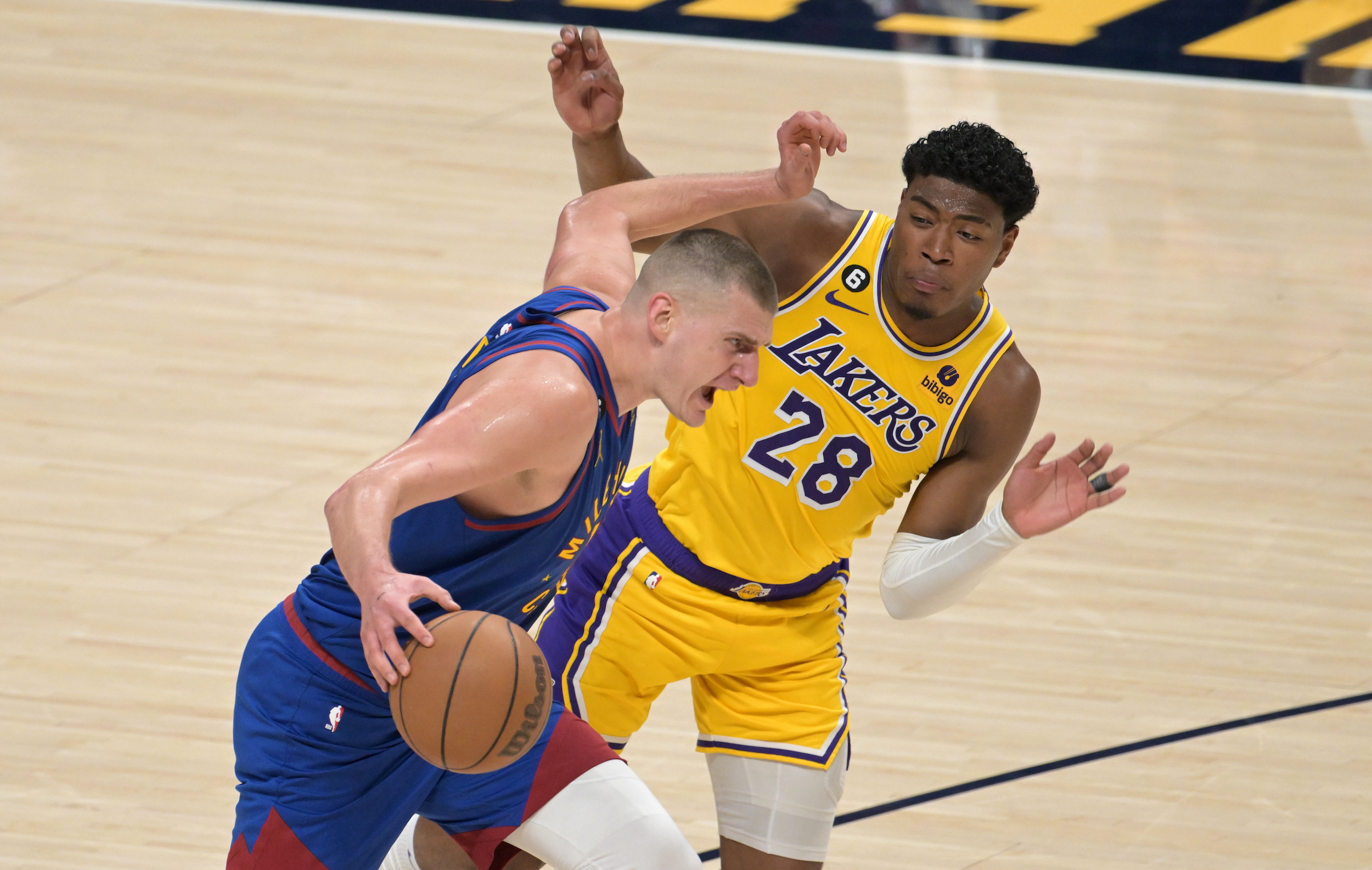 DENVER, CO - MAY 16 : Rui Hachimura (28) of the Los Angeles Lakers fouls Nikola Jokic (15) of the Denver Nuggets during 1st game of Western Conference Final at Ball Arena in Denver, Colorado on Tuesday, May 16, 2023. (Photo by Hyoung Chang/The Denver Post)