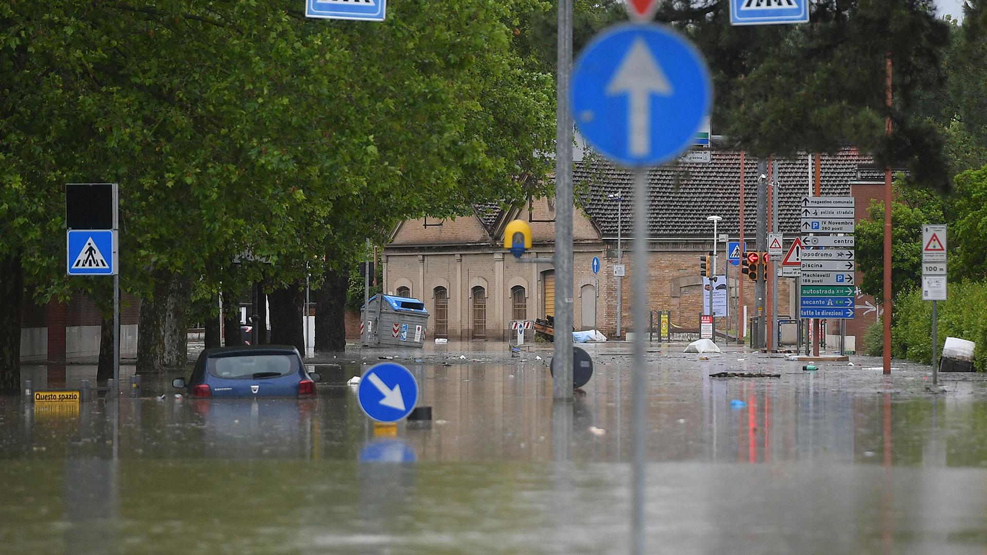 A flooded street is pictured in Cesena on May 17, 2023 after heavy rains caused major floodings in central Italy. Trains were stopped and schools were closed in many towns while people were asked to leave the ground floors of their homes and to avoid going out, and five people have died after the floodings across Italy's northern Emilia Romagna region.