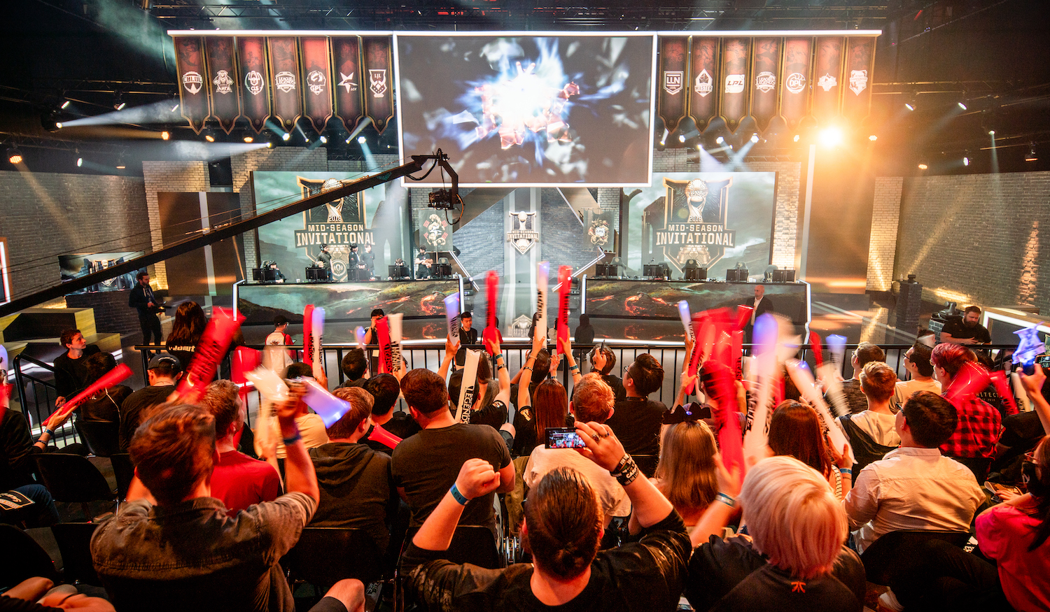 BERLIN, GERMANY - MAY 14 : Fans cheering to game stage during the 2018 League of Legends Mid-Season Invitational Groups Stage at the EU LCS Studio on May 14, 2018 in Berlin, Germany. (Photo by Wojciech Wandzel/Riot Games via Getty Images)