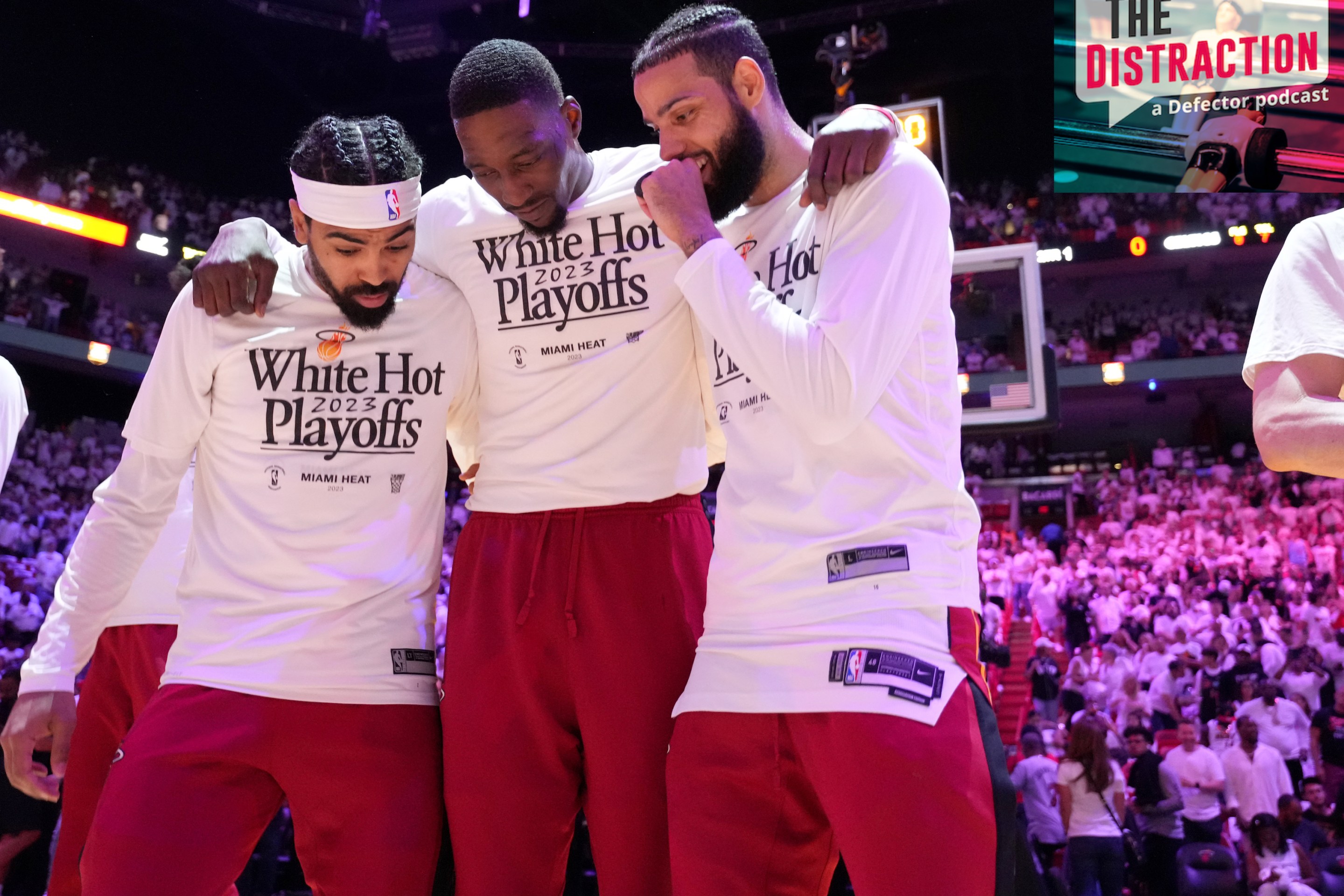 Gabe Vincent, Bam Adebayo, and Caleb Martin stand together as the team is introduced before Game 4 of the Eastern Conference Finals.
