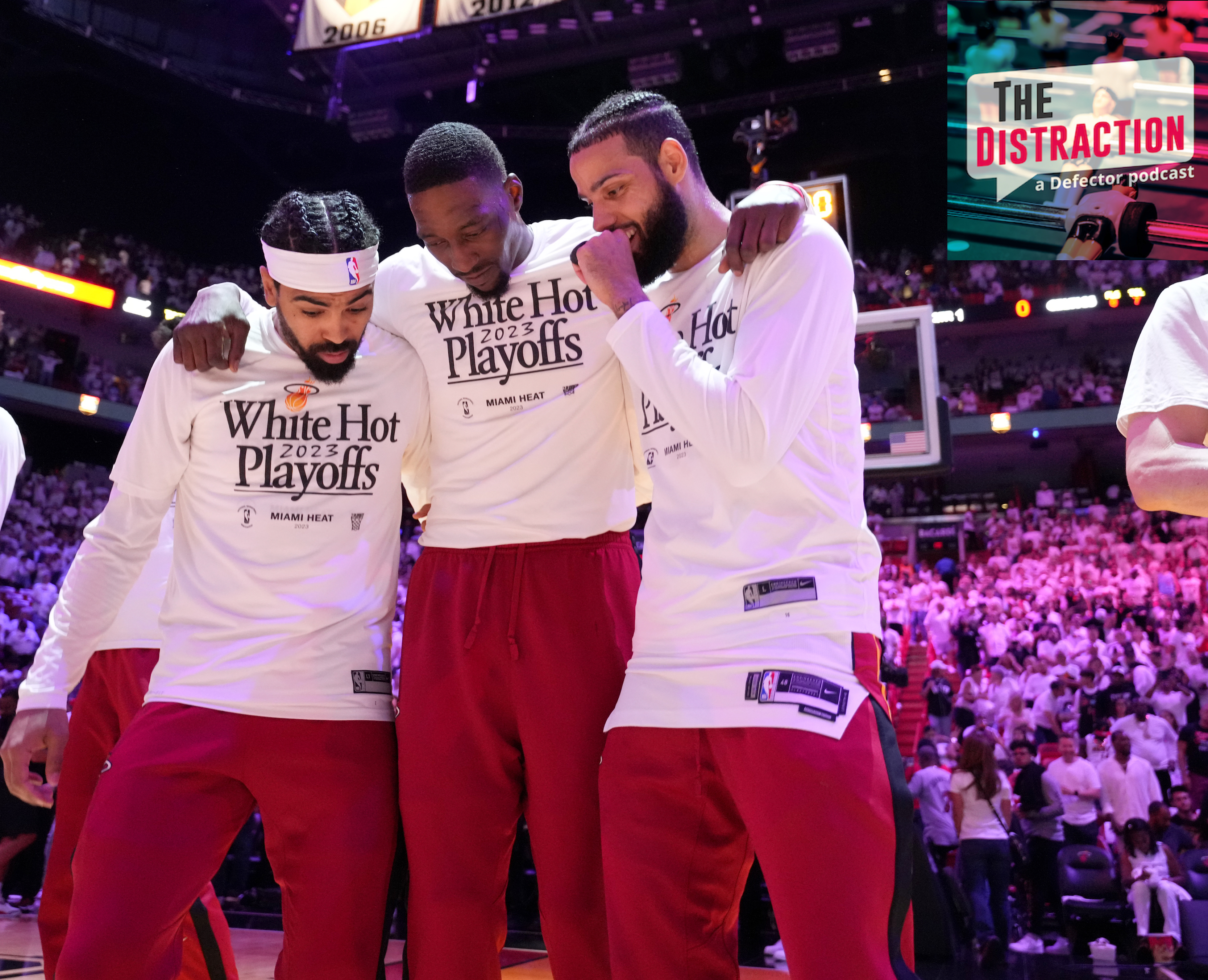 Gabe Vincent, Bam Adebayo, and Caleb Martin stand together as the team is introduced before Game 4 of the Eastern Conference Finals.