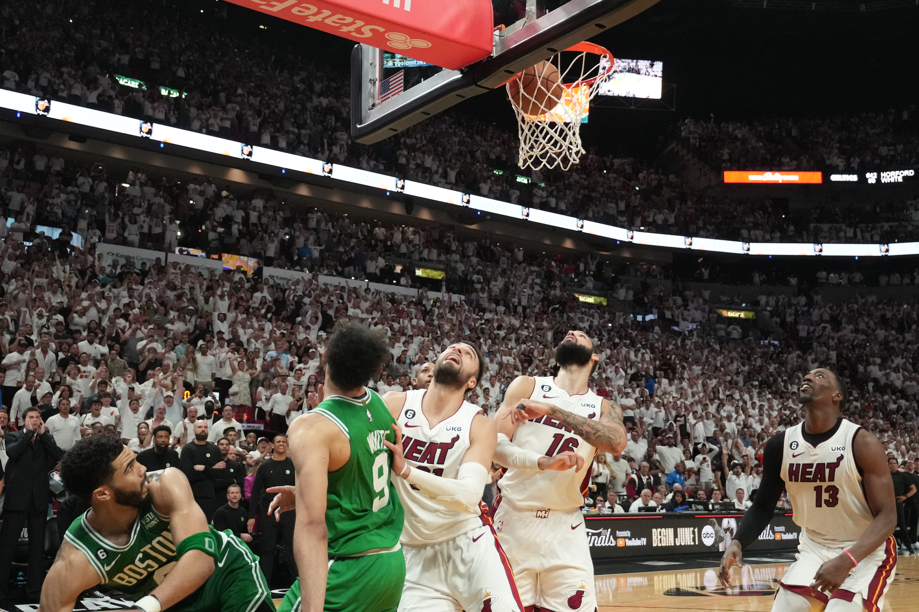 MIAMI, FL - MAY 27: Derrick White #9 of the Boston Celtics shoots the game winner during Game Six of the Eastern Conference Finals against the Miami Heat on May 27, 2023 at the Kaseya Center in Miami, Florida. NOTE TO USER: User expressly acknowledges and agrees that, by downloading and or using this Photograph, user is consenting to the terms and conditions of the Getty Images License Agreement. Mandatory Copyright Notice: Copyright 2023 NBAE (Photo by Jesse D. Garrabrant/NBAE via Getty Images)