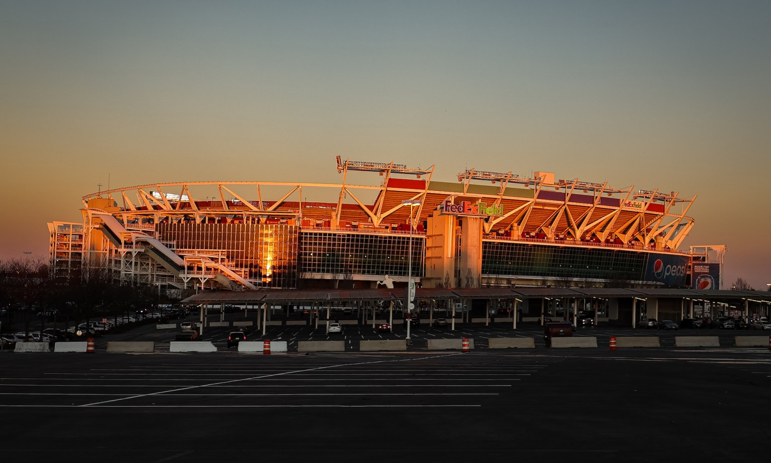 Commanders fans celebrate new ownership and mull over new stadium during  home opener - WTOP News