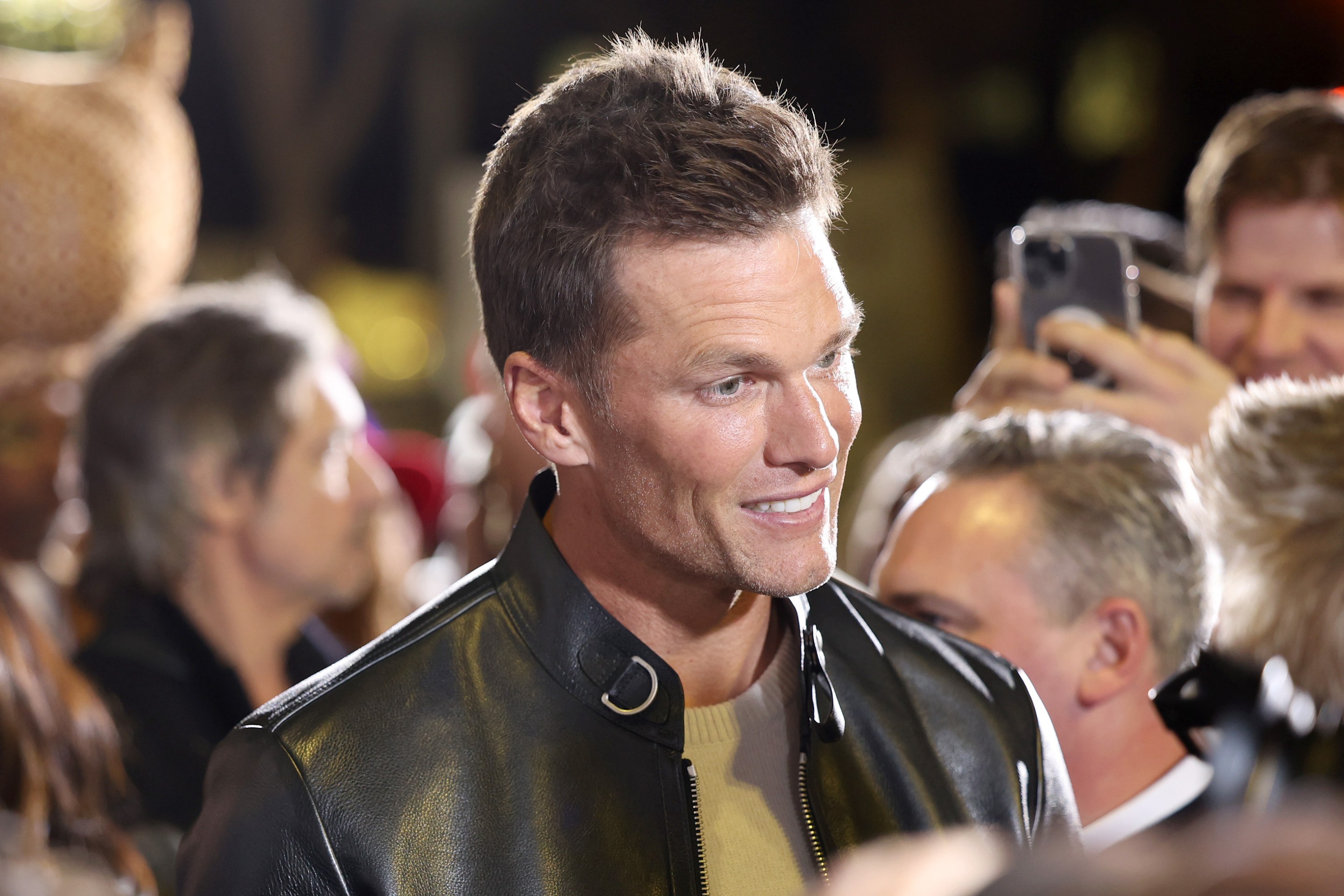 LOS ANGELES, CALIFORNIA - JANUARY 31: Tom Brady attends the Los Angeles Premiere of Paramount Pictures’ “80 For Brady” presented by Smirnoff ICE at the Regency Village Theatre on January 31, 2023 in Los Angeles, California. (Photo by Phillip Faraone/Getty Images for Paramount Pictures)