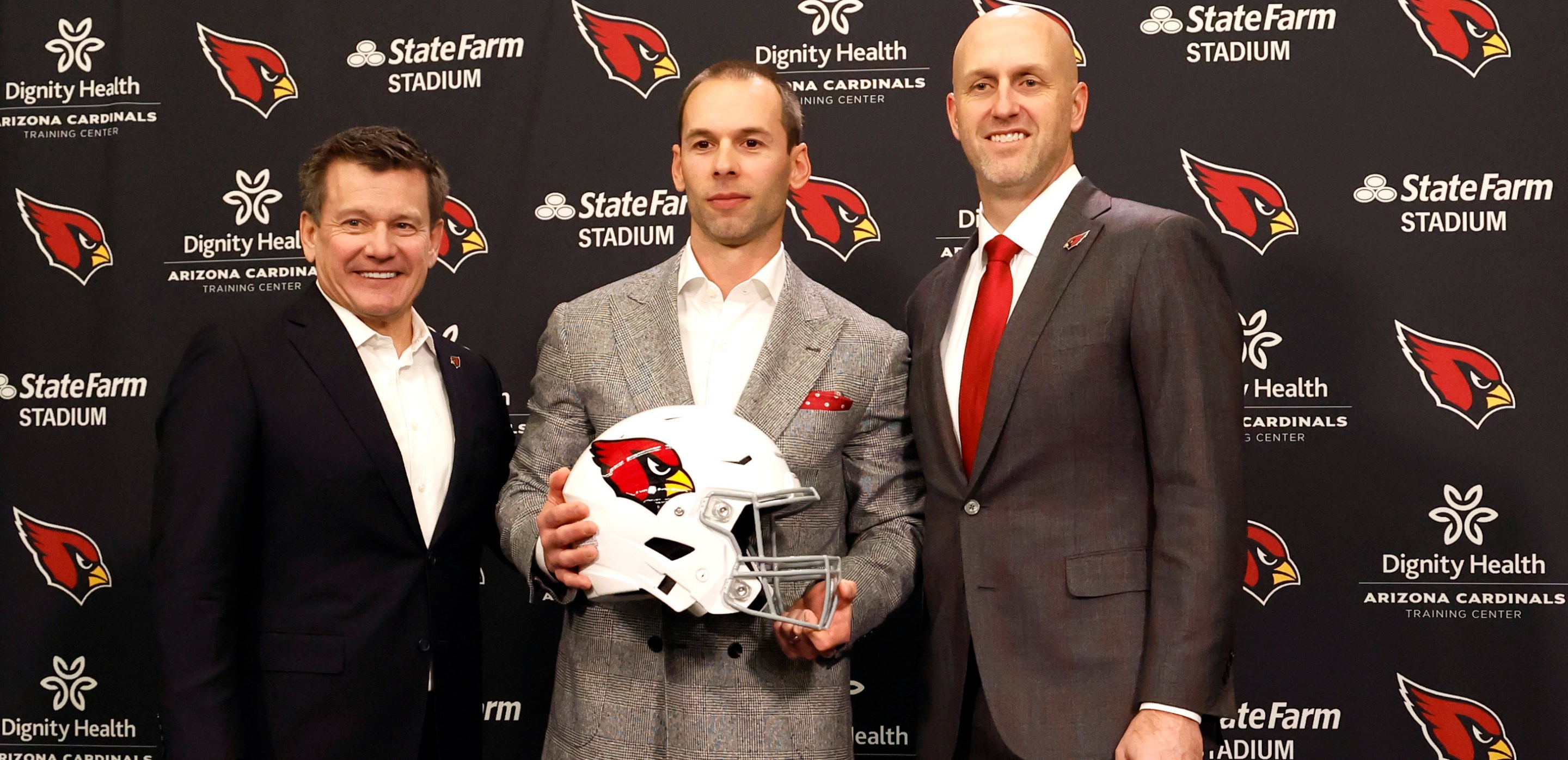 TEMPE, ARIZONA - FEBRUARY 16: (L-R) Owner Michael Bidwill, new head coach Jonathan Gannon and general manager Monti Ossenfort of the Arizona Cardinals pose for a photo during a press conference at Dignity Health Arizona Cardinals Training Center on February 16, 2023 in Tempe, Arizona. (Photo by Chris Coduto/Getty Images)