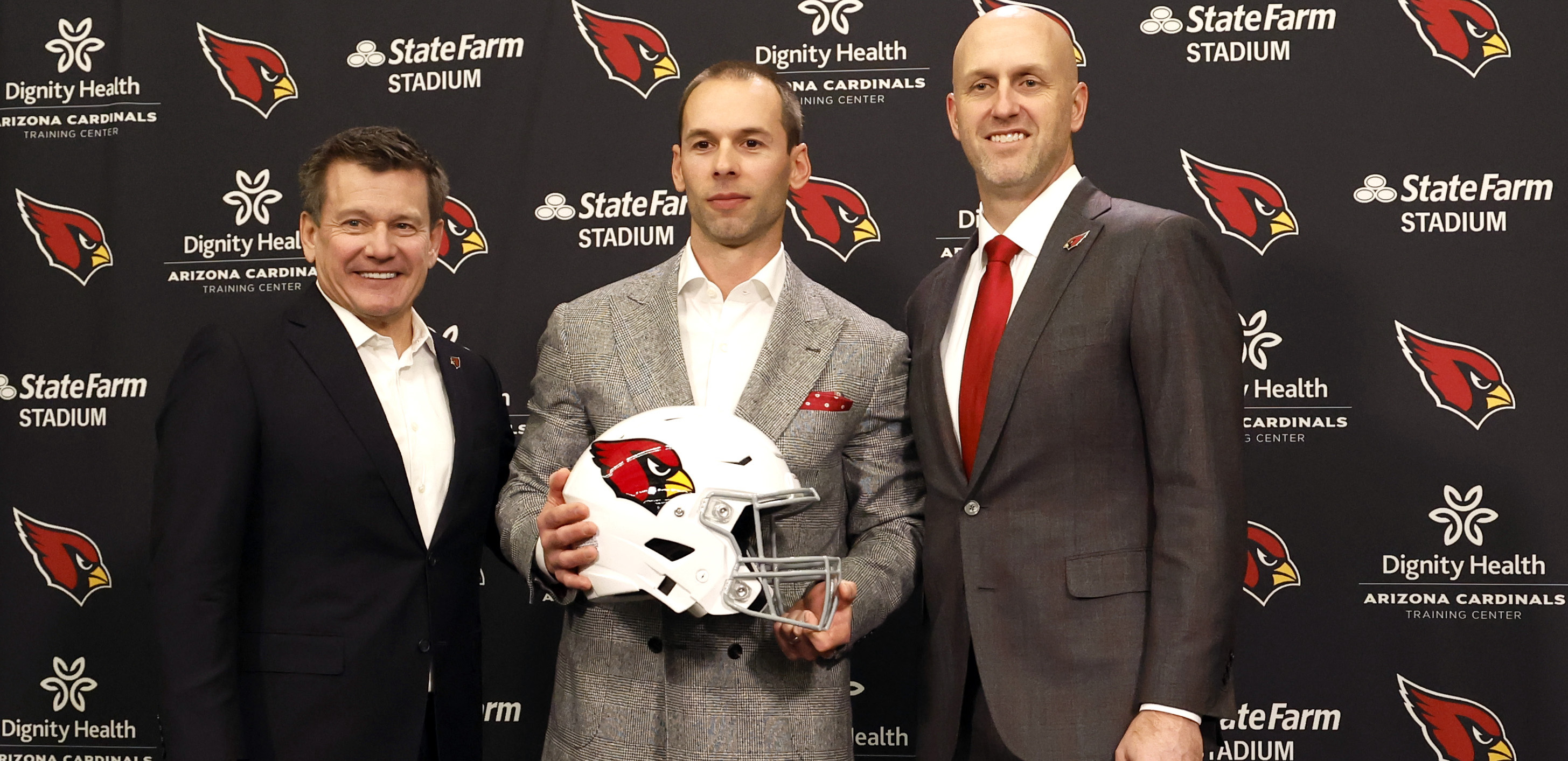 TEMPE, ARIZONA - FEBRUARY 16: (L-R) Owner Michael Bidwill, new head coach Jonathan Gannon and general manager Monti Ossenfort of the Arizona Cardinals pose for a photo during a press conference at Dignity Health Arizona Cardinals Training Center on February 16, 2023 in Tempe, Arizona. (Photo by Chris Coduto/Getty Images)