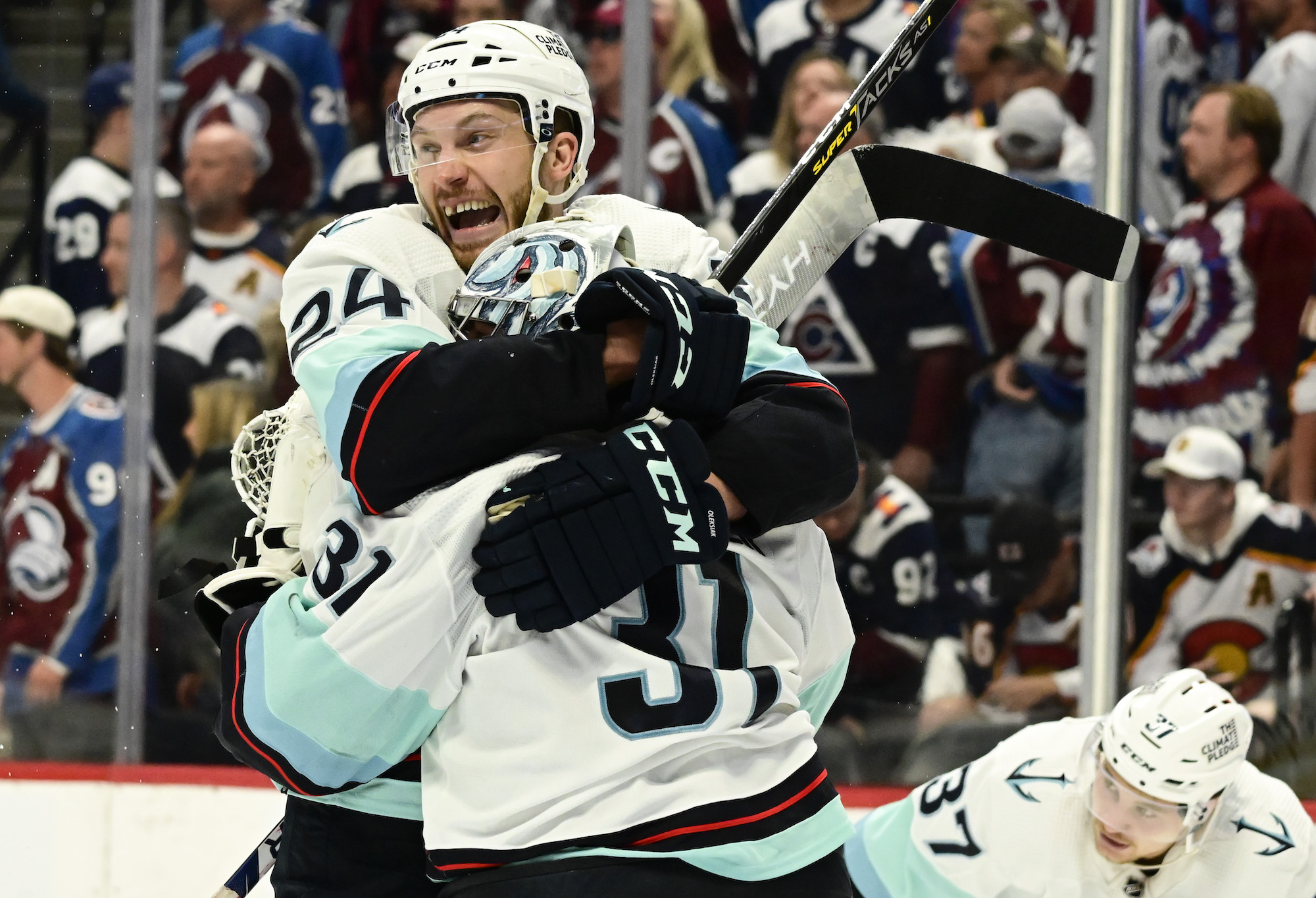 DENVER, CO - APRIL 30: Jamie Oleksiak (24) of the Seattle Kraken celebrates with Goaltender Philipp Grubauer (31) after defeating Mikko Rantanen and the Colorado Avalanche winning the first round of the NHL Stanley Cup Playoffs at Ball Arena April 30, 2023. The Avalanche lost 2-1. (Photo by Andy Cross/The Denver Post)