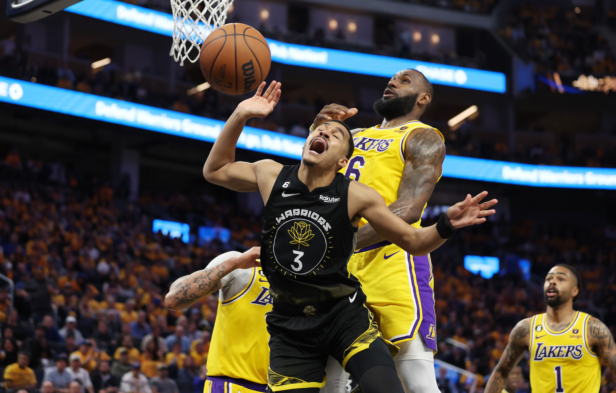 SAN FRANCISCO, CALIFORNIA - MAY 02: LeBron James #6 of the Los Angeles Lakers blocks a shot by Jordan Poole #3 of the Golden State Warriors during the third quarter in game one of the Western Conference Semifinal Playoffs at Chase Center on May 02, 2023 in San Francisco, California. NOTE TO USER: User expressly acknowledges and agrees that, by downloading and or using this photograph, User is consenting to the terms and conditions of the Getty Images License Agreement. (Photo by Ezra Shaw/Getty Images)