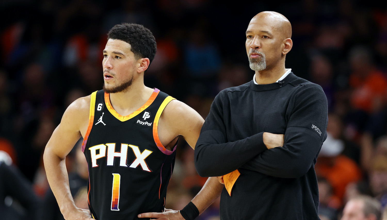 PHOENIX, ARIZONA - MAY 11: Devin Booker #1 stands with head coach Monty Williams of the Phoenix Suns during the second quarter against the Denver Nuggets in game six of the Western Conference Semifinal Playoffs at Footprint Center on May 11, 2023 in Phoenix, Arizona. NOTE TO USER: User expressly acknowledges and agrees that, by downloading and or using this photograph, User is consenting to the terms and conditions of the Getty Images License Agreement. (Photo by Christian Petersen/Getty Images)