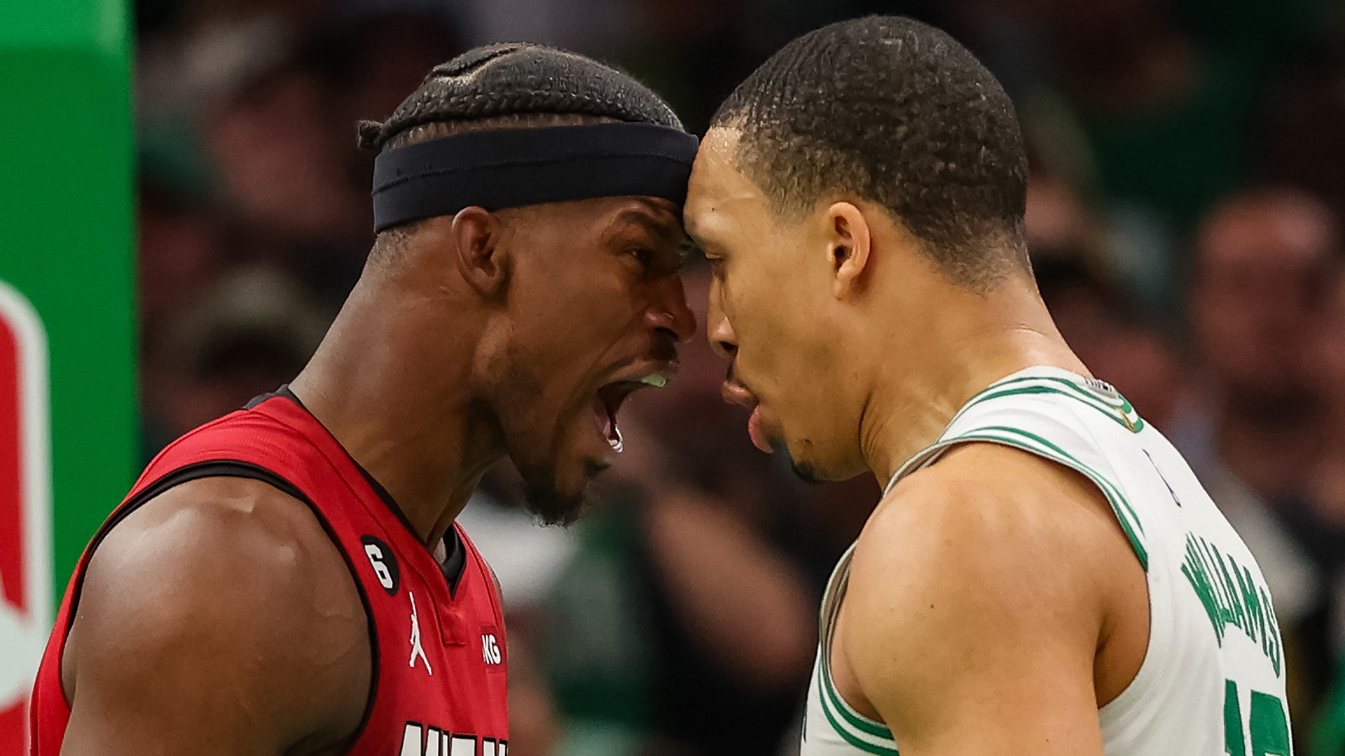 Jimmy Butler #22 of the Miami Heat exchanges words with Grant Williams #12 of the Boston Celtics during the fourth quarter in game two of the Eastern Conference Finals at TD Garden on May 19, 2023 in Boston, Massachusetts.