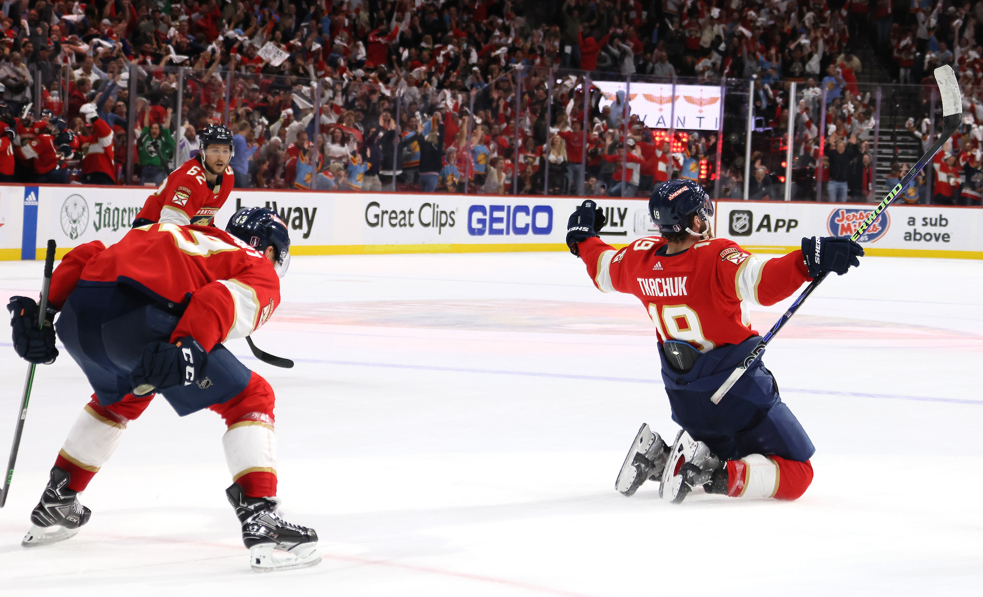 SUNRISE, FLORIDA - MAY 24: Matthew Tkachuk #19 of the Florida Panthers celebrates with his teammates after scoring the game winning goal on Frederik Andersen #31 of the Carolina Hurricanes during the third period in Game Four of the Eastern Conference Final of the 2023 Stanley Cup Playoffs at FLA Live Arena on May 24, 2023 in Sunrise, Florida. (Photo by Bruce Bennett/Getty Images)