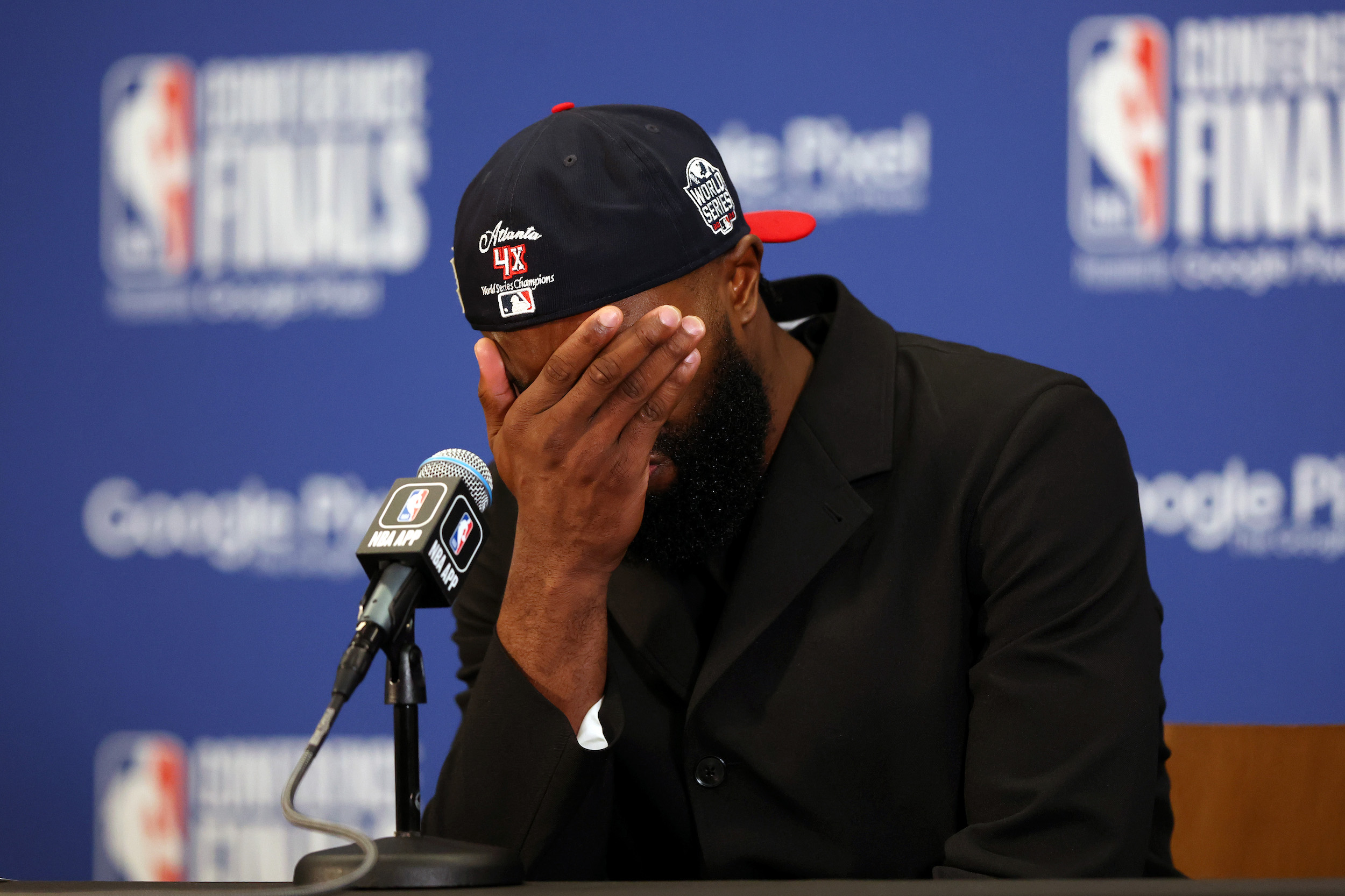 Jaylen Brown looks miserable during the post-game press conference.