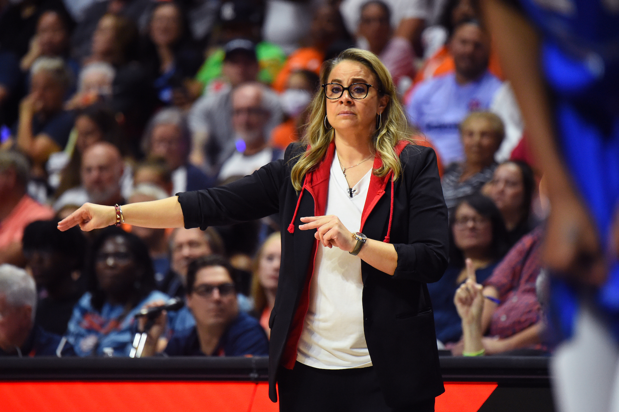Becky Hammon coaches the Las Vegas Aces in the 2022 WNBA Finals