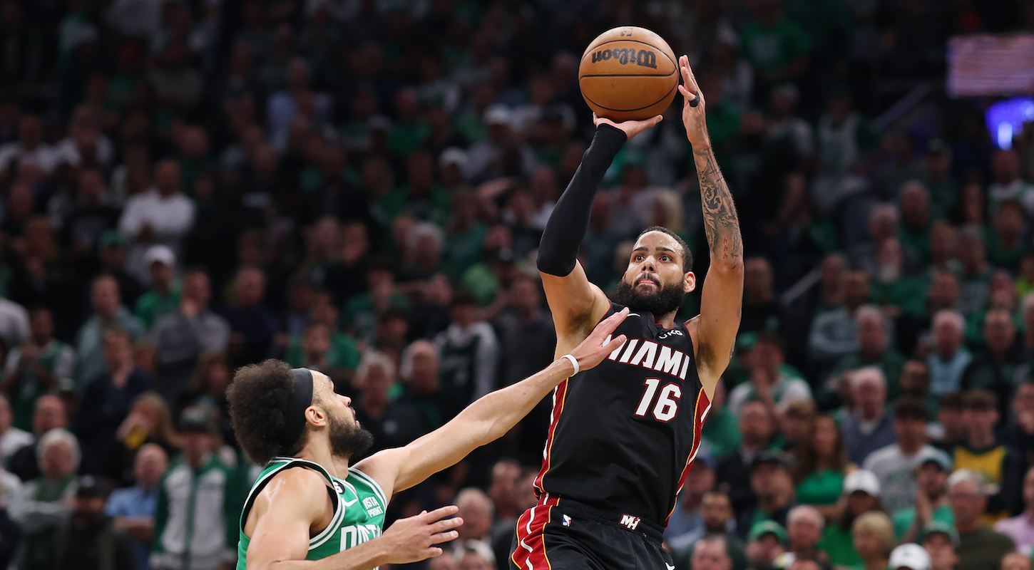 Caleb Martin of the Miami Heat shoots over Derrick White of the Boston Celtics in Monday night's Game 7 of the Eastern Conference Finals