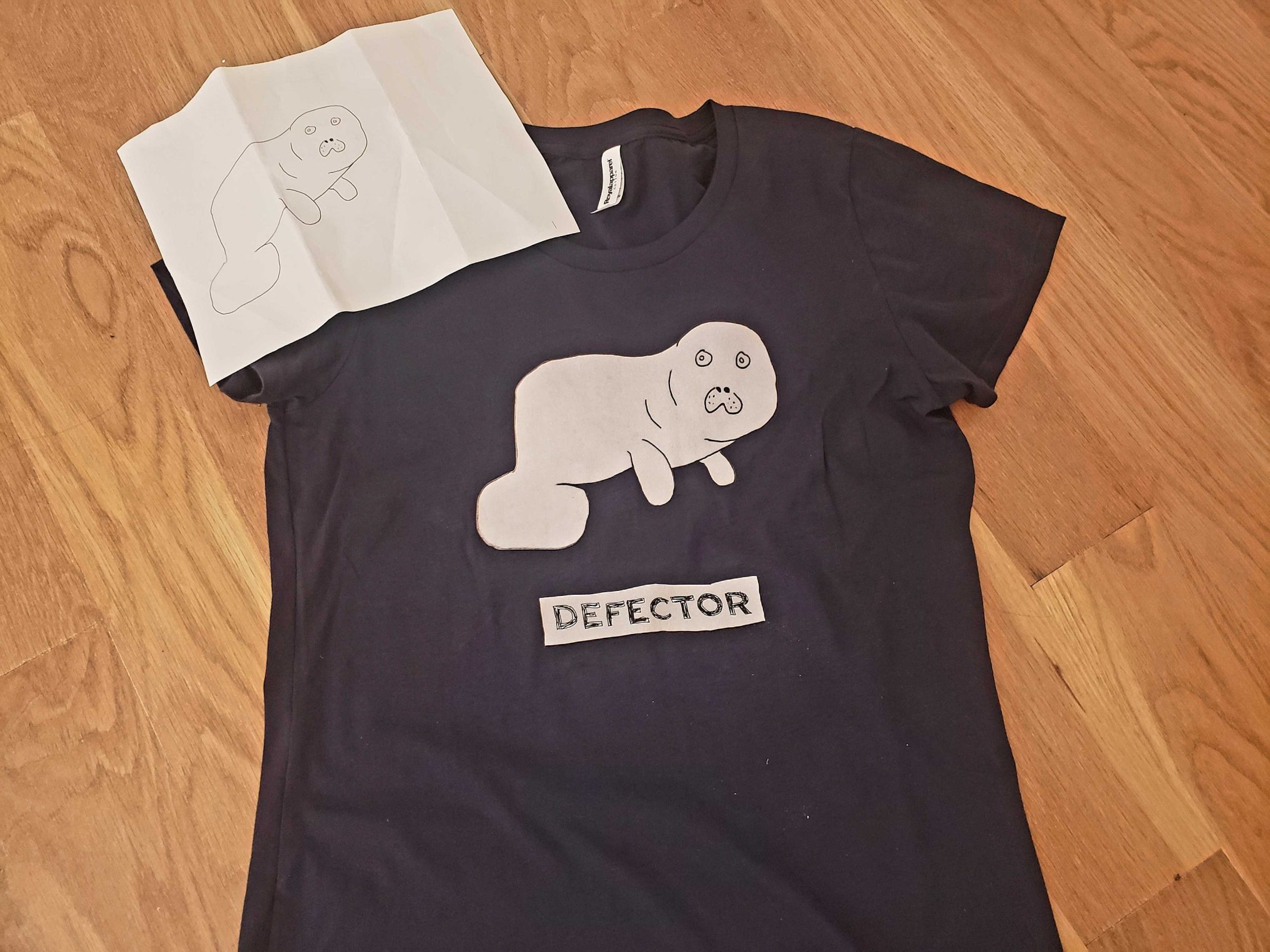 Devin the Dugong drawing with t-shirt
