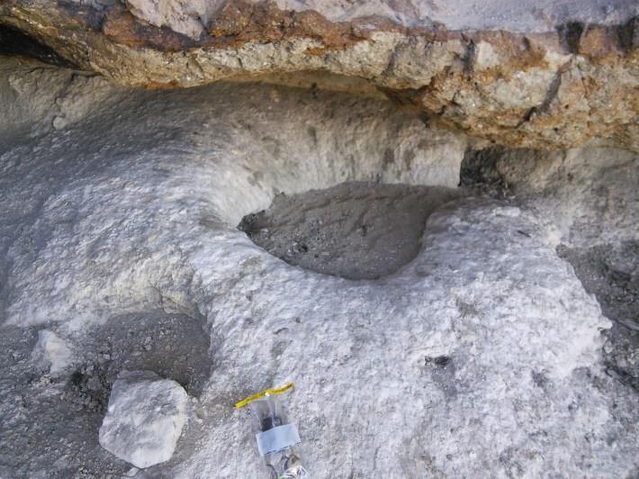 The Andean condor nest, which looks like a big white donut made of rock